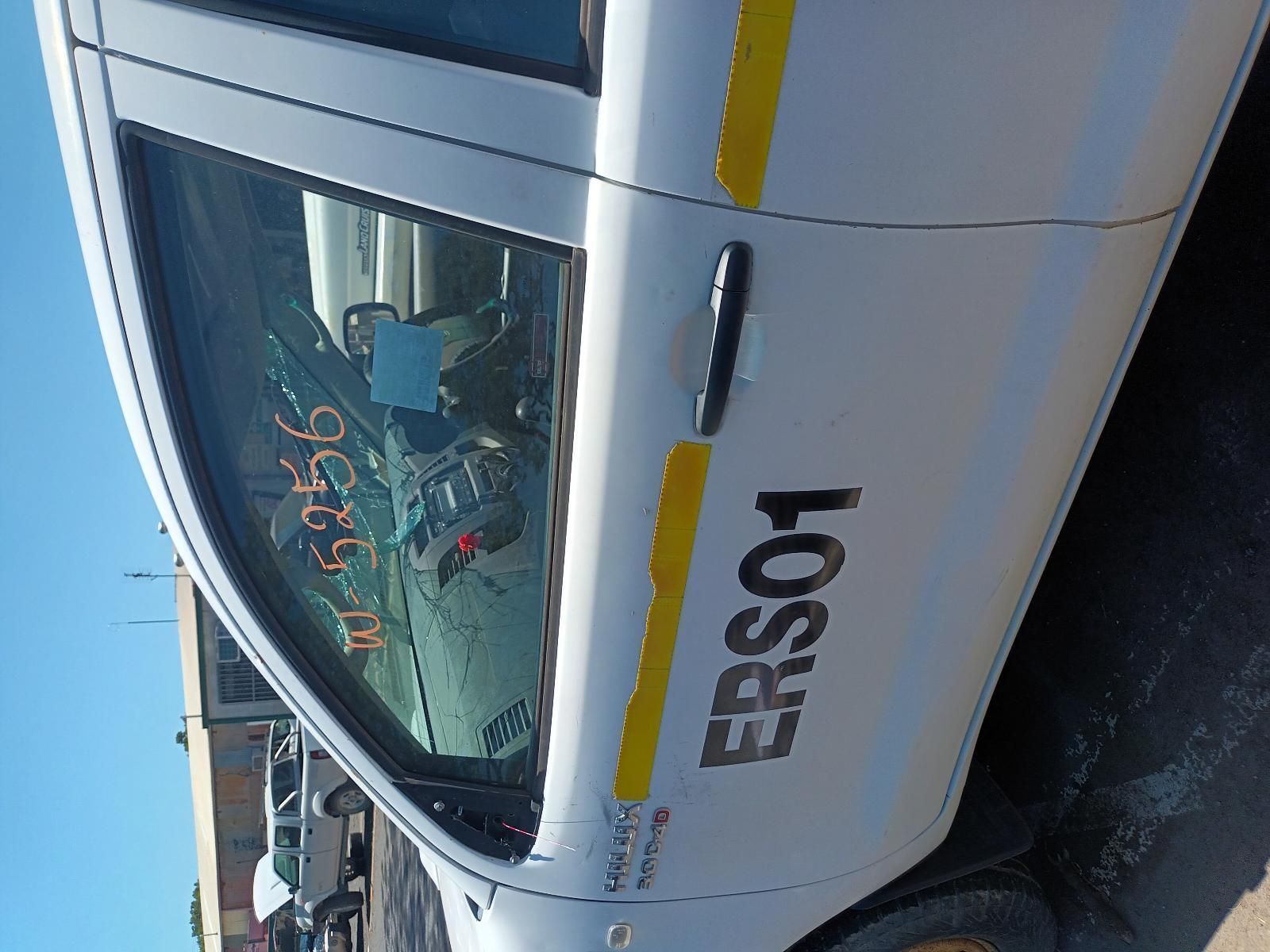 A White Car with the Word ERS01 on the Side — South West 4WD Wreckers in Harristown, QLD