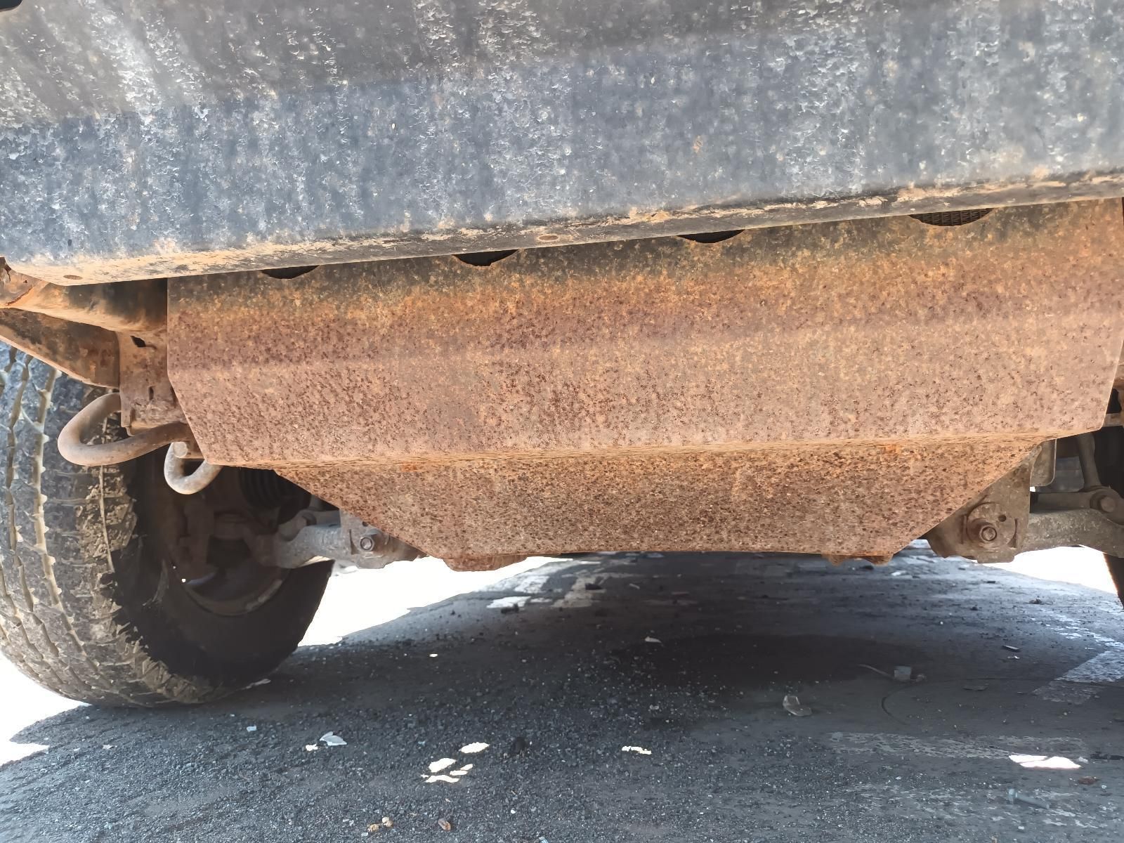 The Underside of a Rusty Car is Shown — South West 4WD Wreckers in Harristown, QLD