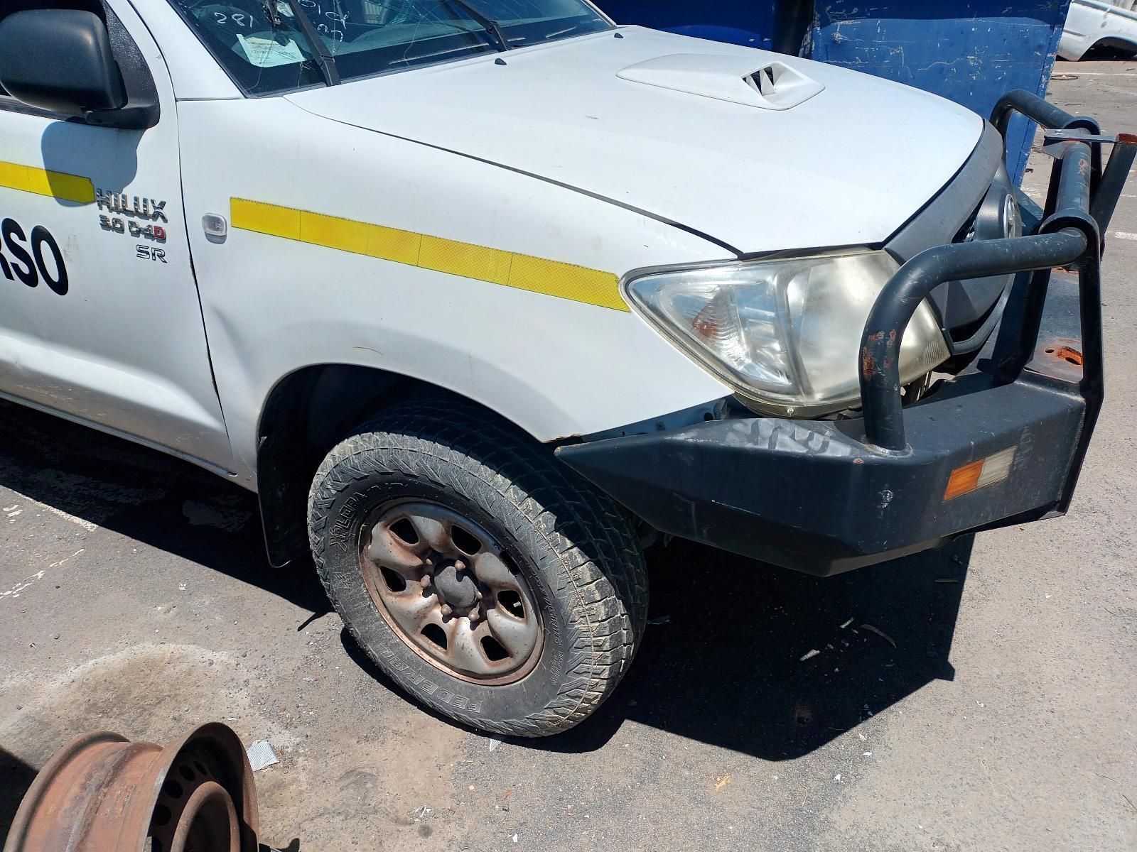 A White Truck with Yellow Decals — South West 4WD Wreckers in Harristown, QLD