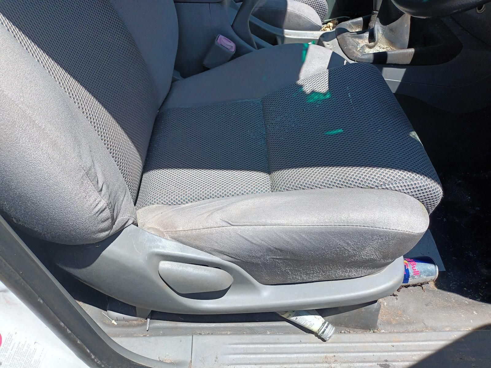 A Car Seat with a Bottle of Toothpaste on It — South West 4WD Wreckers in Harristown, QLD