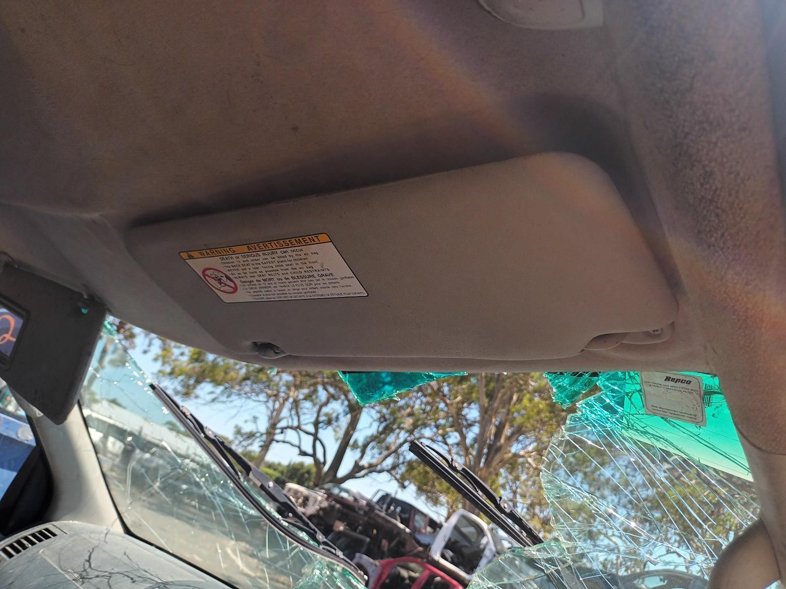 A Sun Visor is Hanging from the Ceiling of a Car — South West 4WD Wreckers in Harristown, QLD