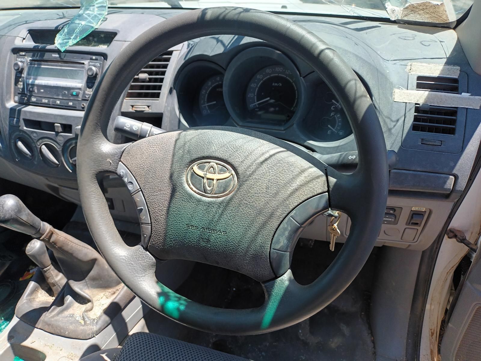A Dirty Steering Wheel with a Toyota Logo on It — South West 4WD Wreckers in Harristown, QLD