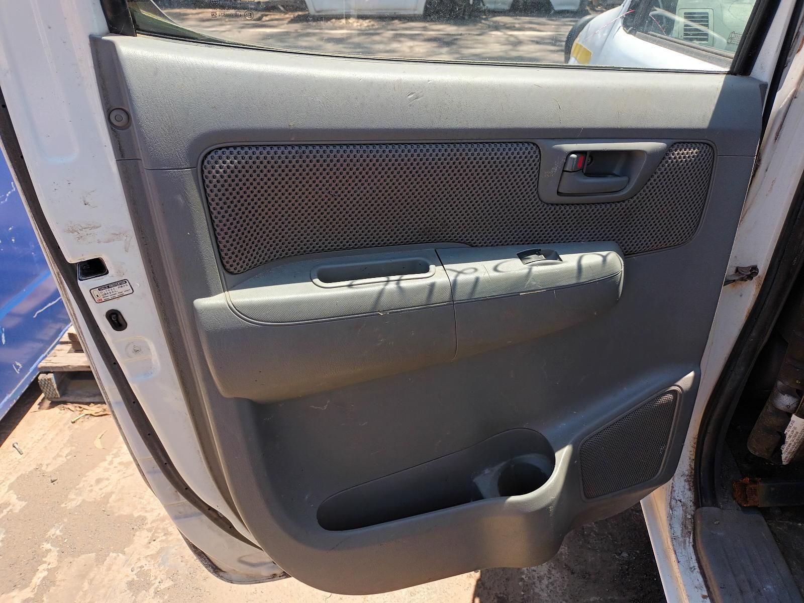 The Inside of a White Car with the Door Open — South West 4WD Wreckers in Harristown, QLD