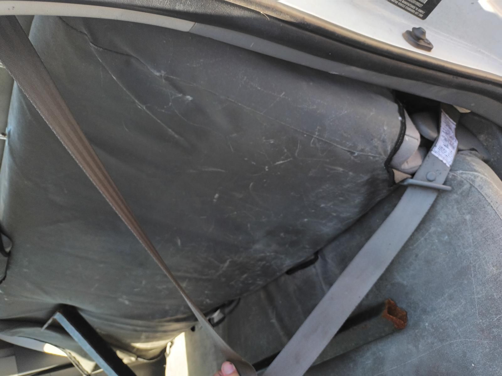 A Person is Holding a Seat Belt in a Car — South West 4WD Wreckers in Harristown, QLD