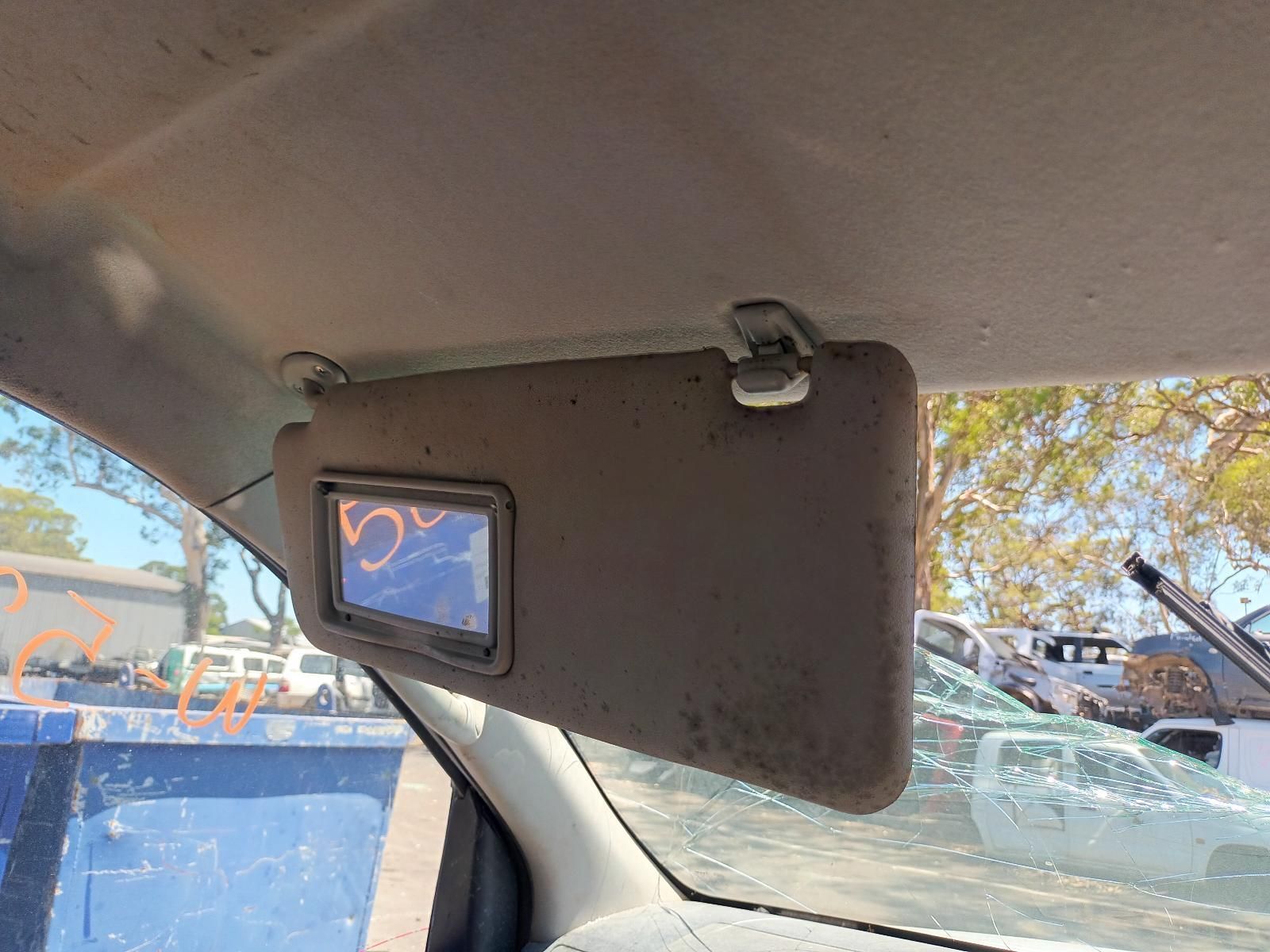 A Sun Visor is Hanging from the Ceiling of a Car — South West 4WD Wreckers in Harristown, QLD