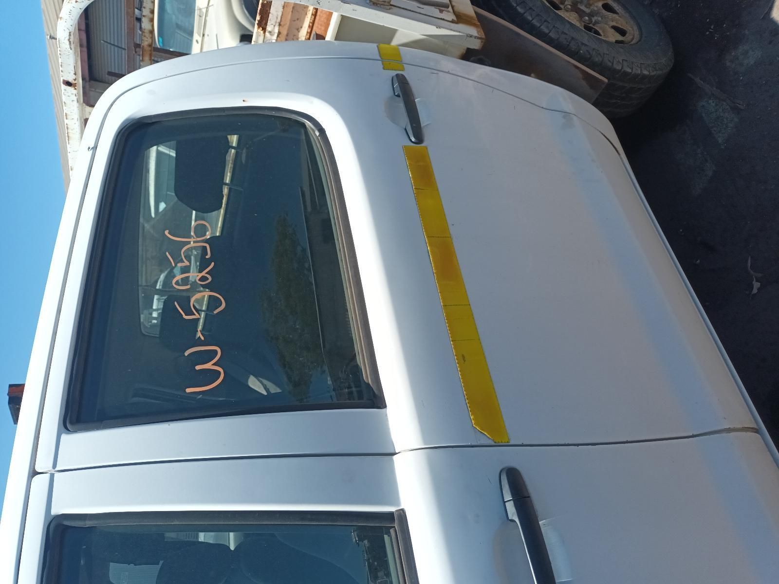 A White Van with a Yellow Stripe on the Side — South West 4WD Wreckers in Harristown, QLD