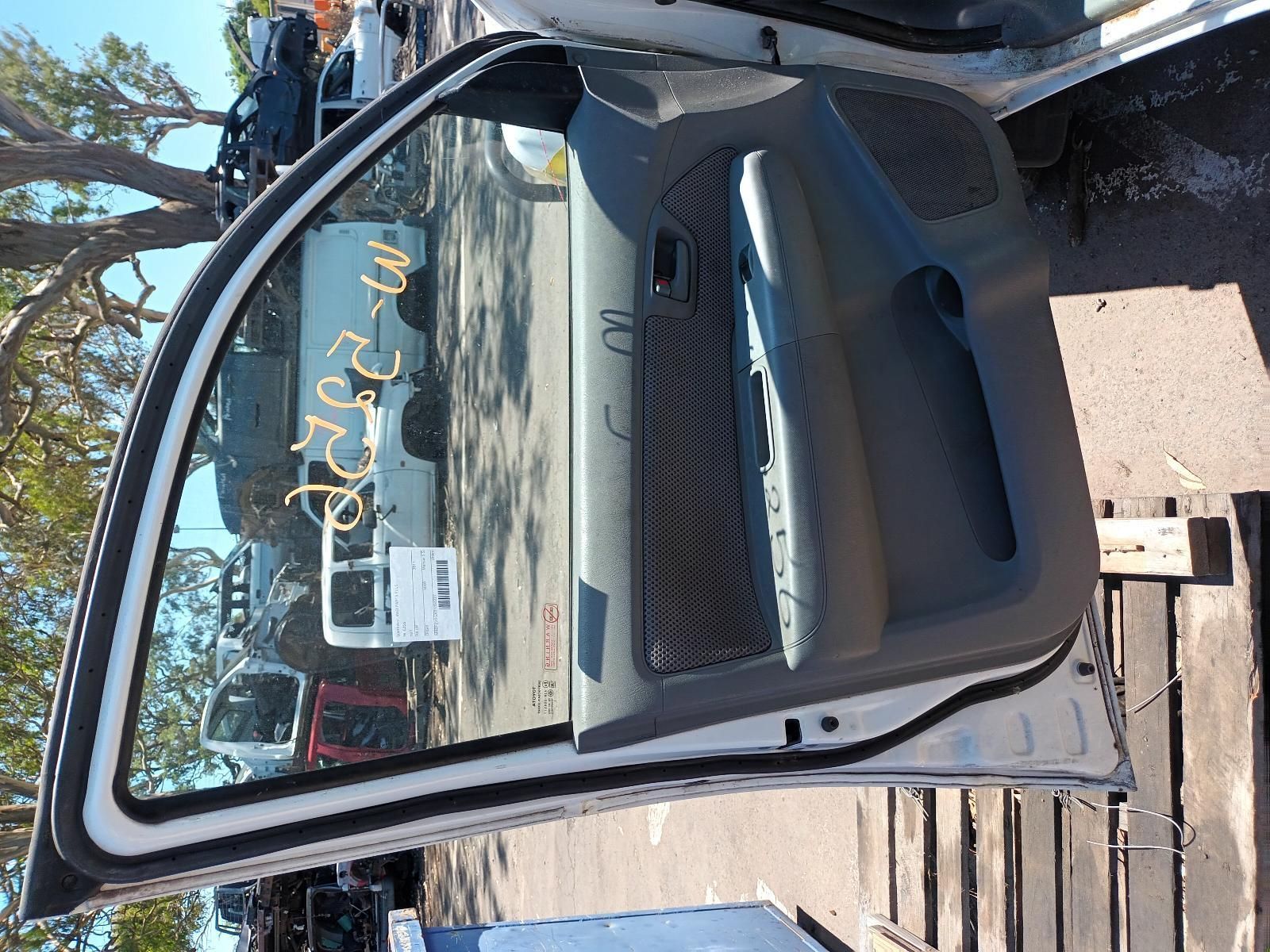 A White Car with the Door Open — South West 4WD Wreckers in Harristown, QLD