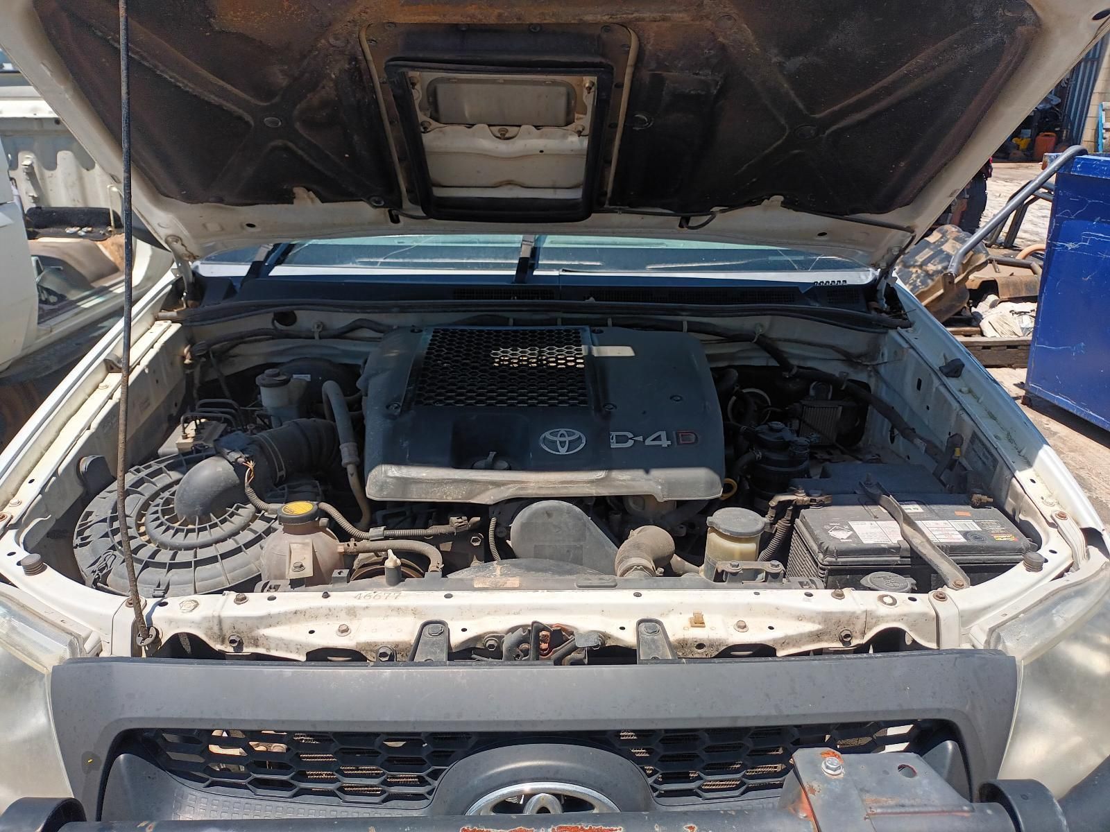 The Engine of a White Toyota Truck is Shown with the Hood Up — South West 4WD Wreckers in Harristown, QLD