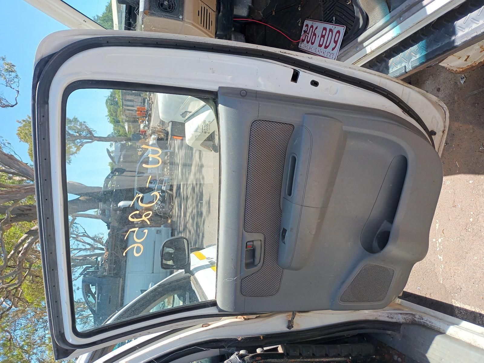 A White Car with the Door Open and the Rear Window Visible — South West 4WD Wreckers in Harristown, QLD