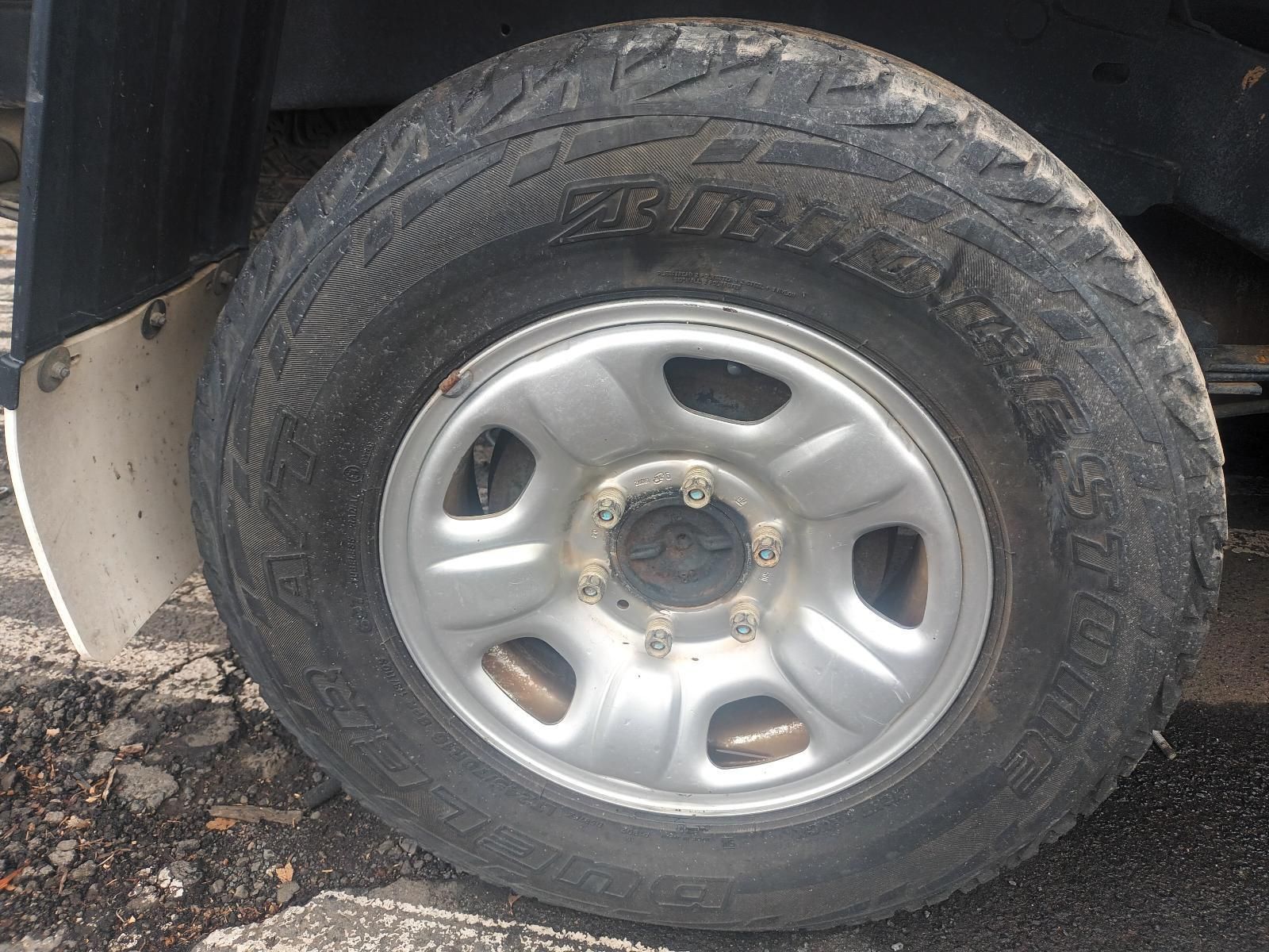 A Close Up of a Tire on a Car That Says Bridgestone — South West 4WD Wreckers In Brisbane, QLD