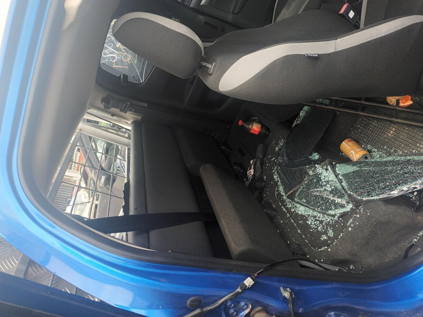 The Inside of a Blue Car with a Broken Glass Window — South West 4WD Wreckers In Brisbane, QLD