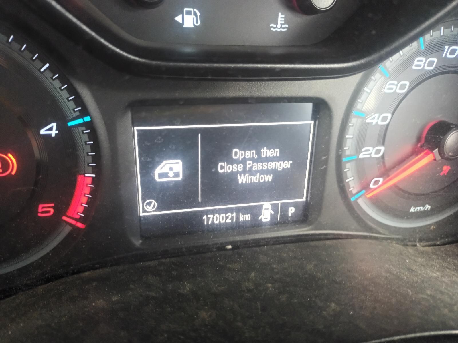 A Car Dashboard with a Screen That Says Open Then Close Passenger Window — South West 4WD Wreckers In Brisbane, QLD