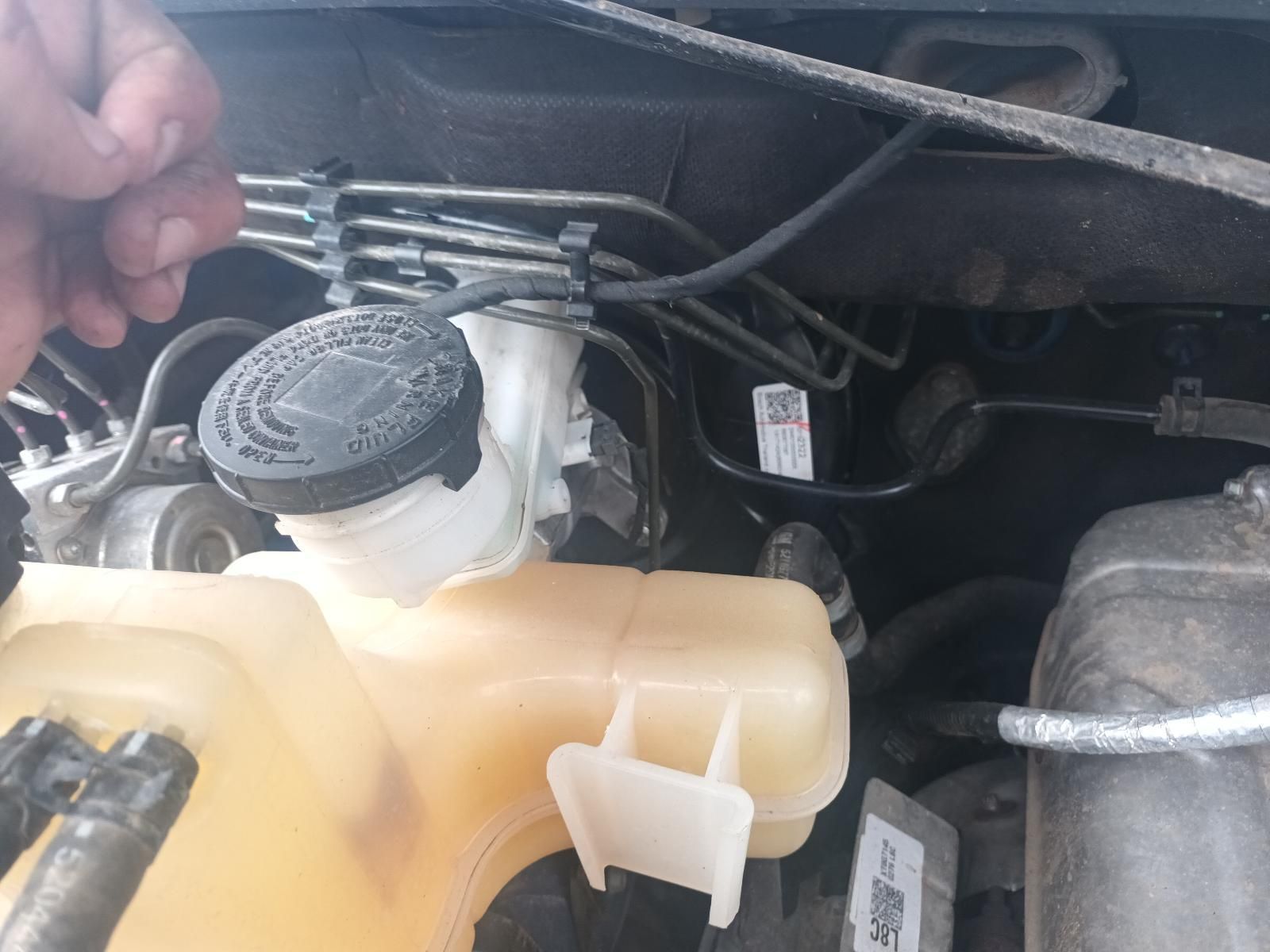 A Close Up of a Brake Fluid Bottle in a Car — South West 4WD Wreckers In Brisbane, QLD