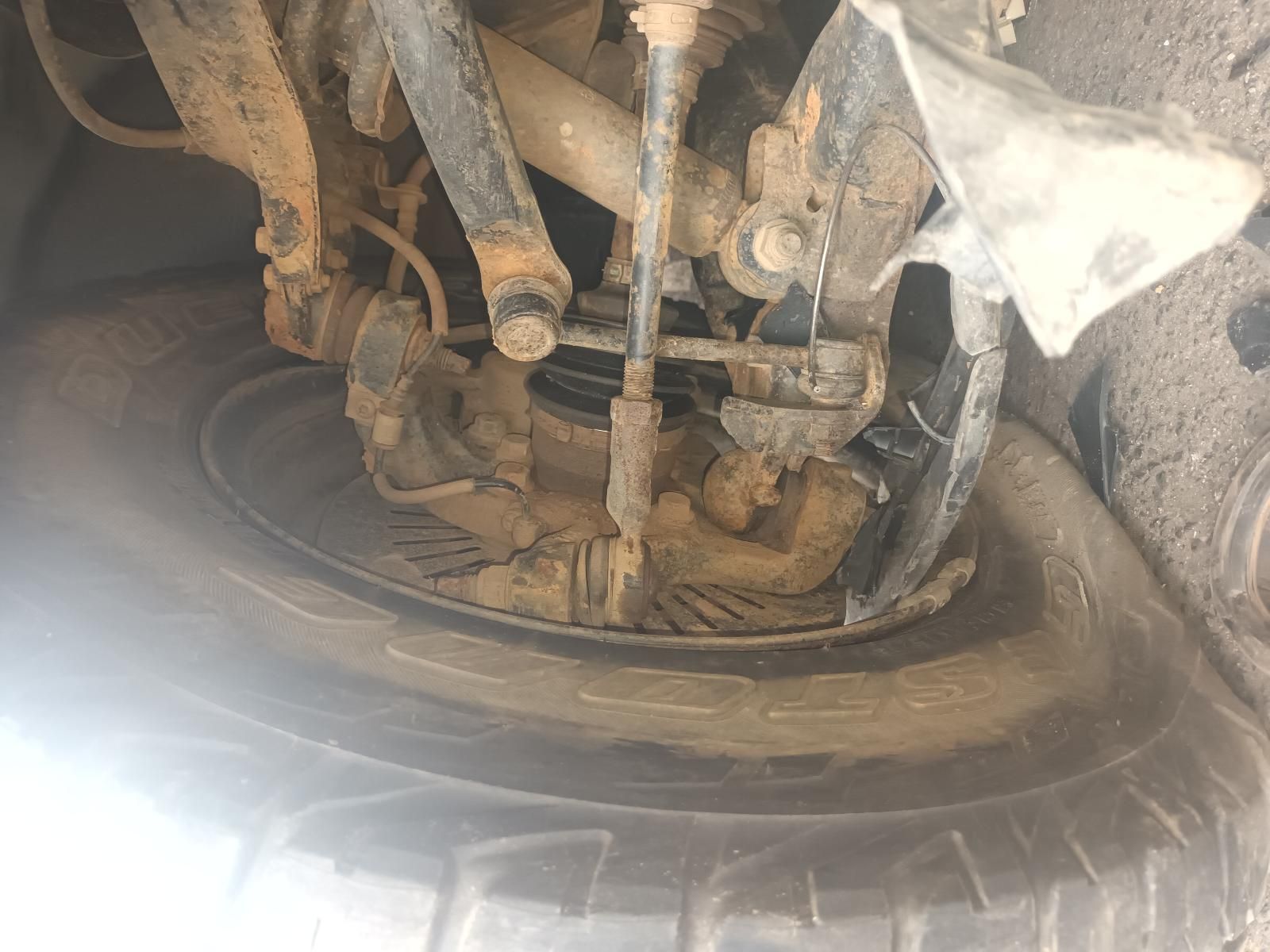 A Close Up of a Tire and Suspension on a Car — South West 4WD Wreckers In Brisbane, QLD