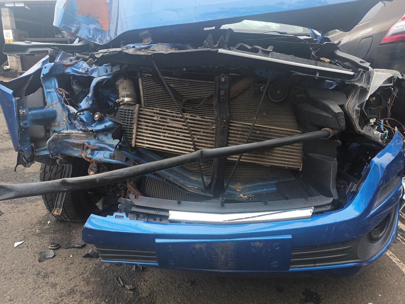 A Blue Car That Has Been Damaged in an Accident — South West 4WD Wreckers In Brisbane, QLD