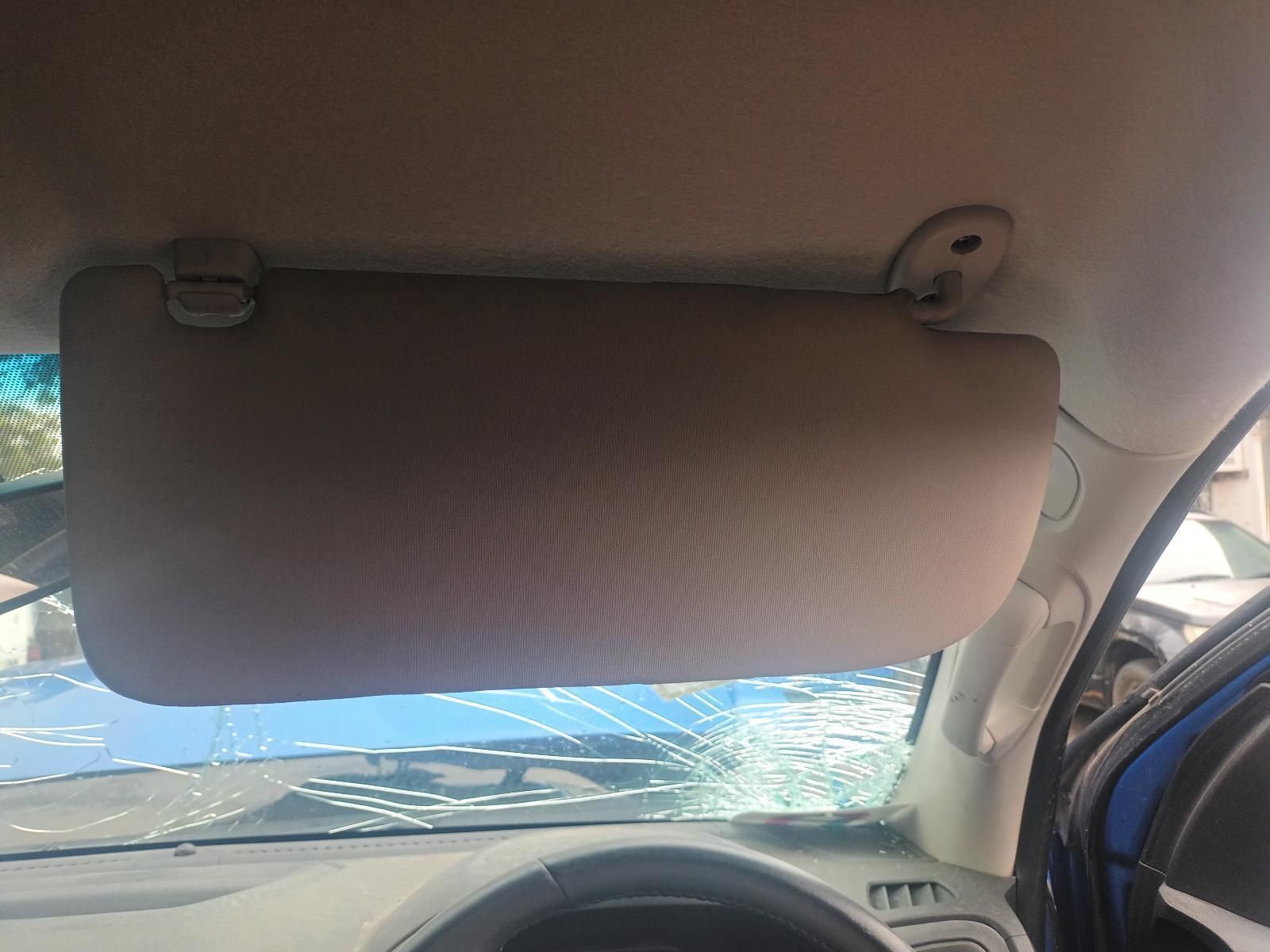 A Sun Visor is Hanging from the Ceiling of a Car — South West 4WD Wreckers In Brisbane, QLD 