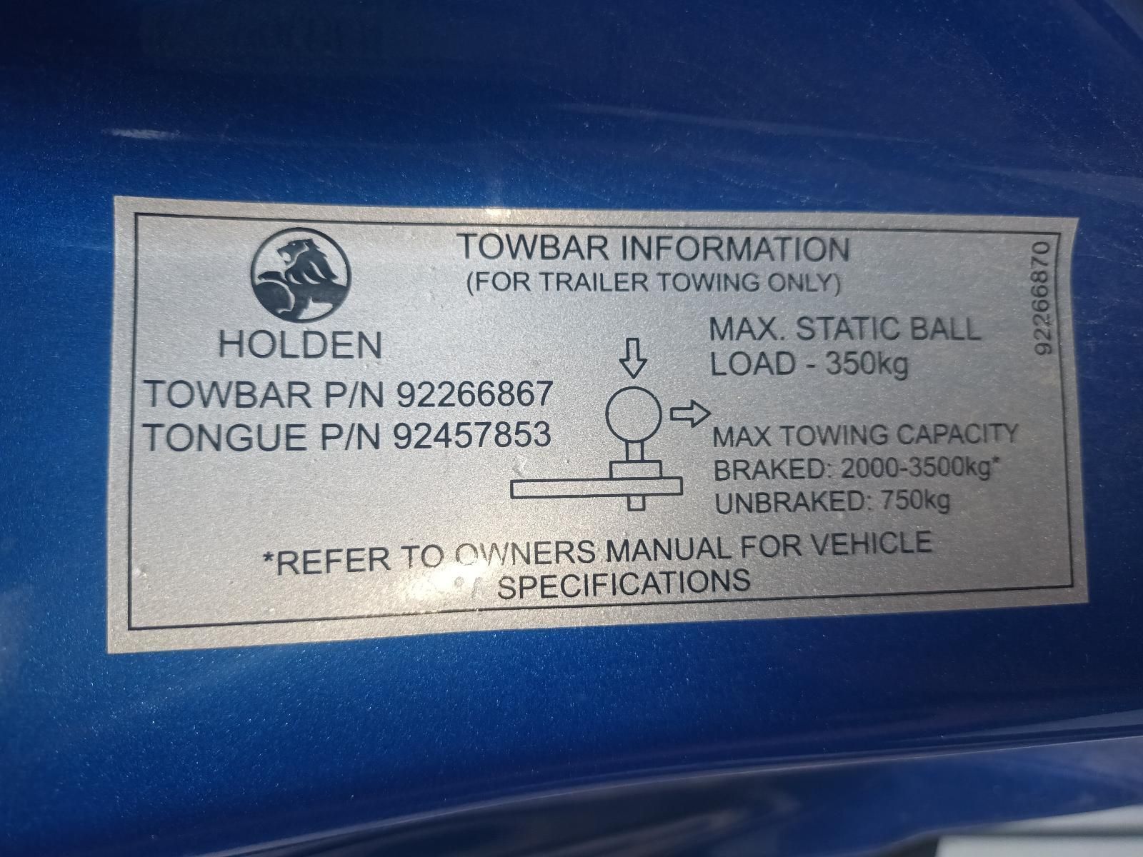 A Blue Holden Towbar Information Sticker on the Side of a Vehicle — South West 4WD Wreckers In Brisbane, QLD