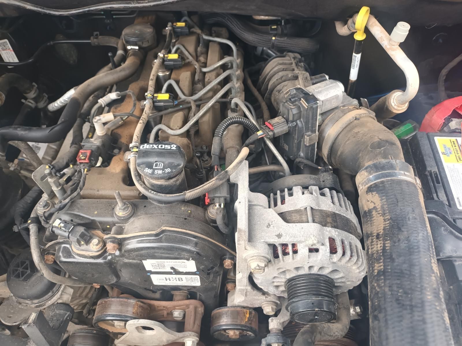 A Close Up of a Car Engine with a Battery in the Background — South West 4WD Wreckers In Brisbane, QLD