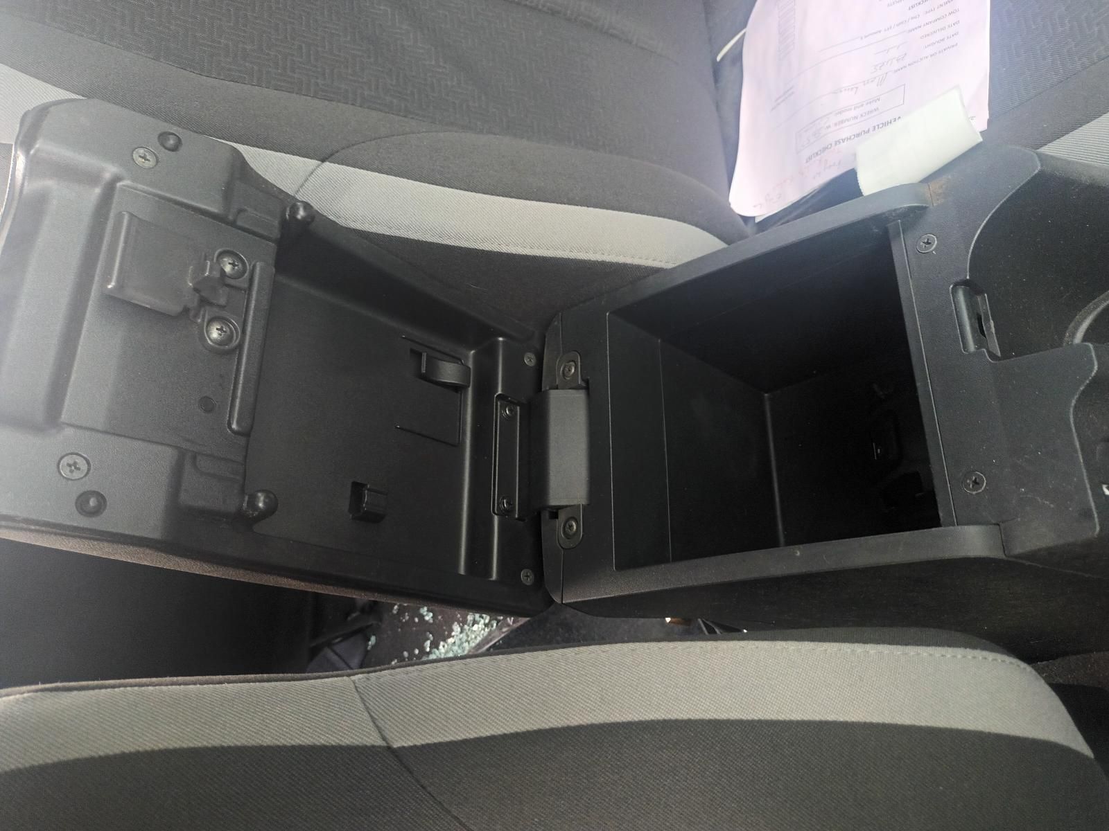 The Arm Rest of a Car is Open and Empty — South West 4WD Wreckers In Brisbane, QLD