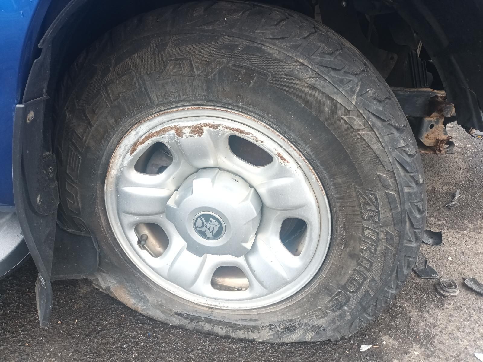 A Close Up of a Flat Tire on a Car — South West 4WD Wreckers In Brisbane, QLD