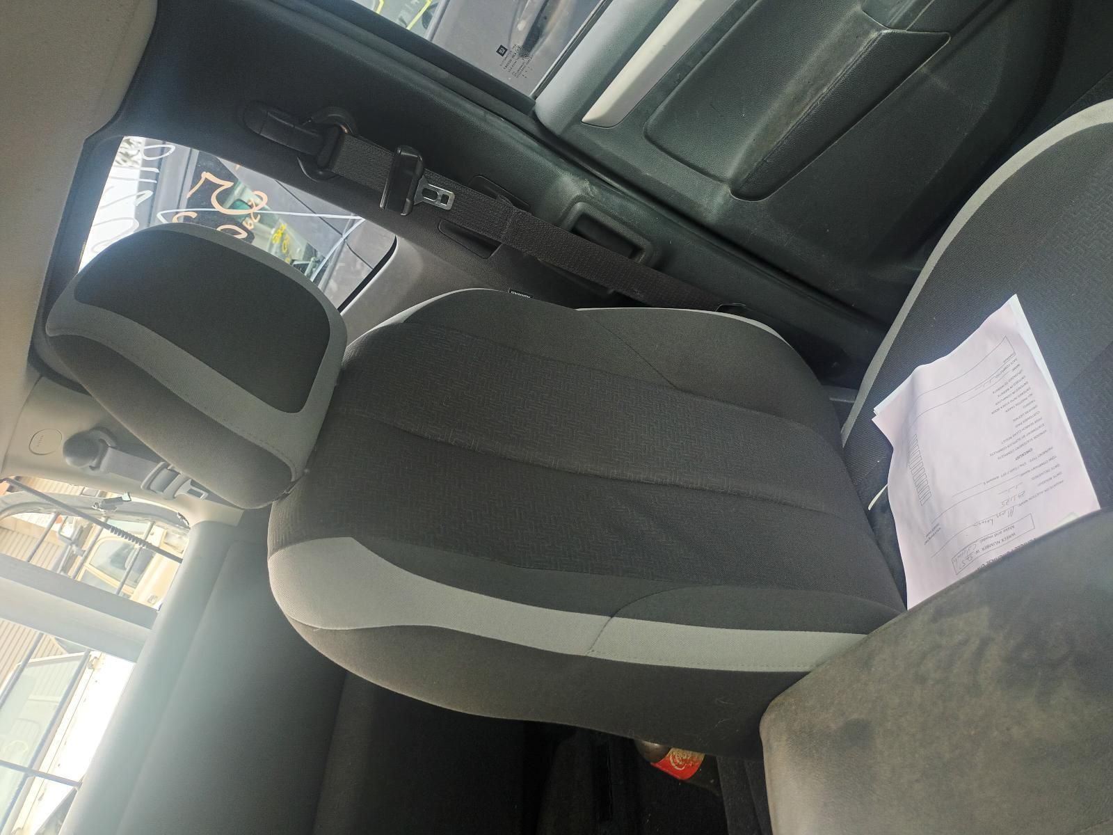 A Close Up of a Car Seat with a Note on It — South West 4WD Wreckers In Brisbane, QLD