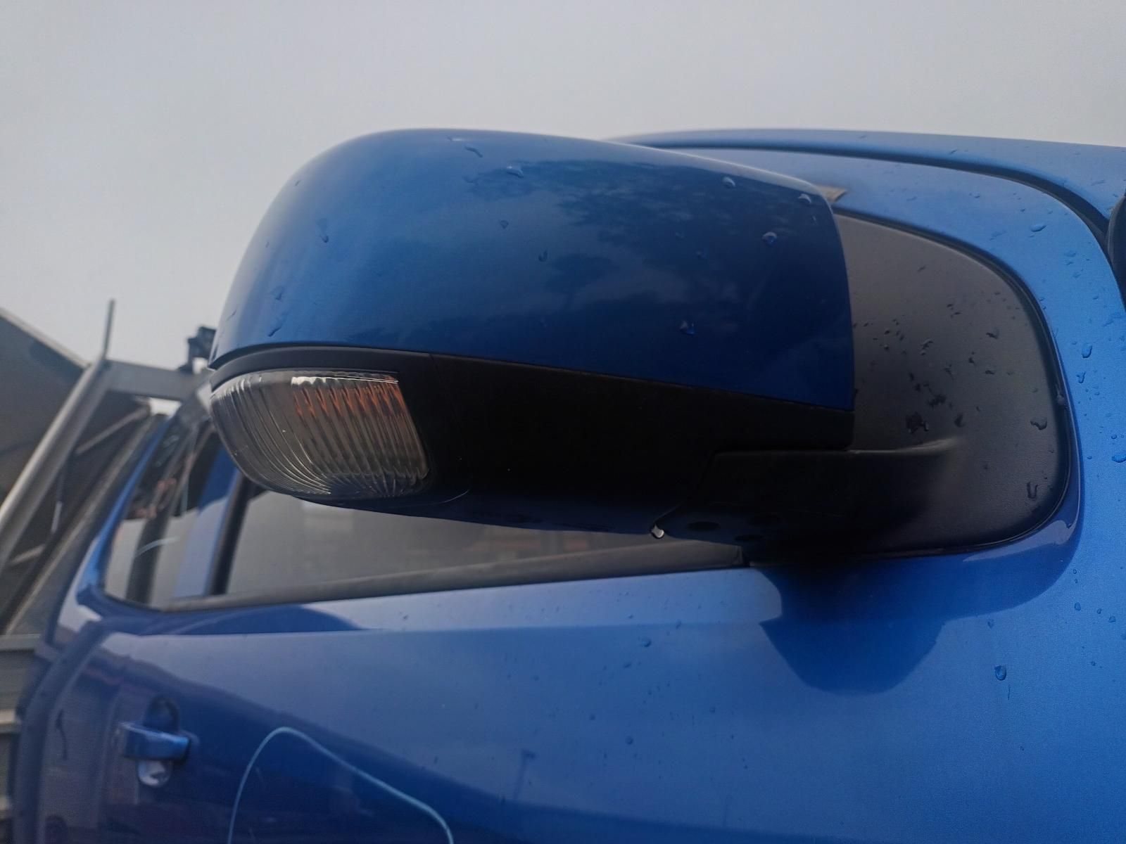 A Close Up of a Blue Car 's Side Mirror — South West 4WD Wreckers In Brisbane, QLD