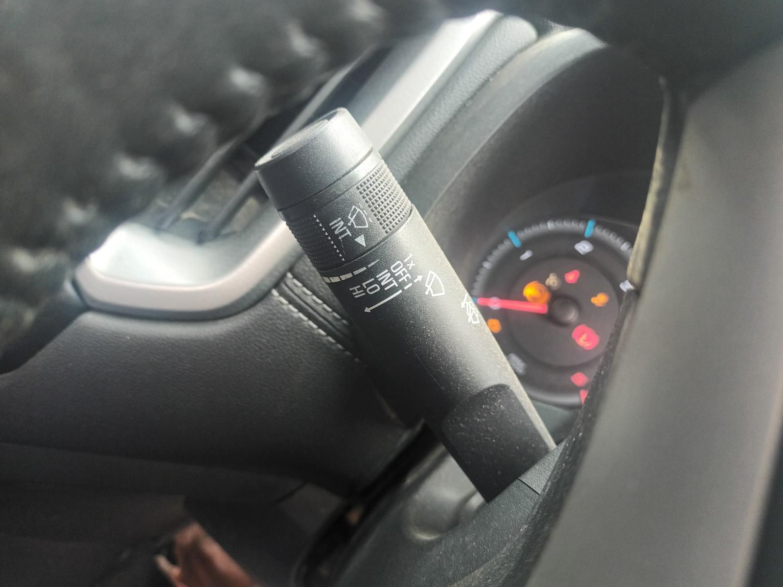 A Close Up of a Car Steering Wheel with a Wiper Switch on It — South West 4WD Wreckers In Brisbane, QLD