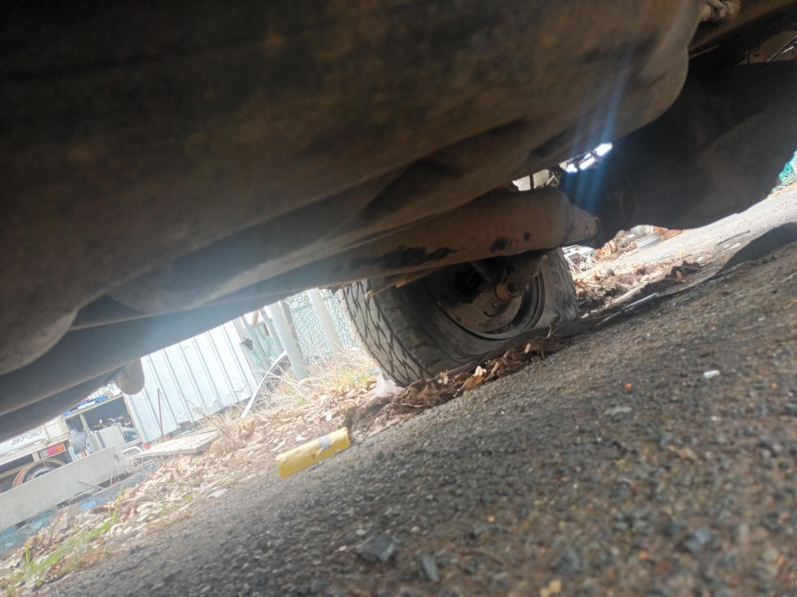 A Close Up of the Underside of a Car Parked on the Ground — South West 4WD Wreckers In Brisbane, QLD