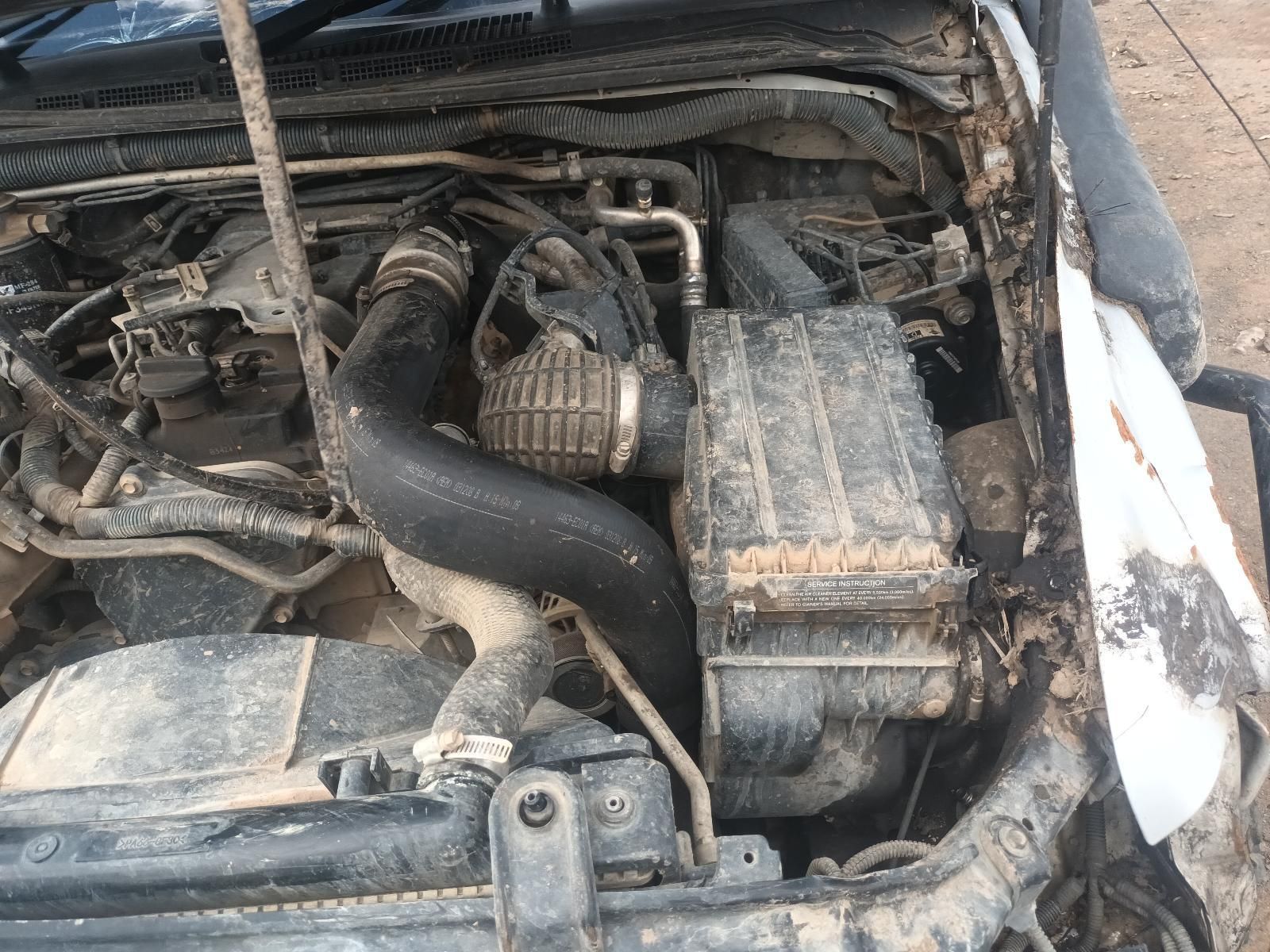 A Close Up of the Engine of a Dirty Car — South West 4WD Wreckers In Brisbane, QLD