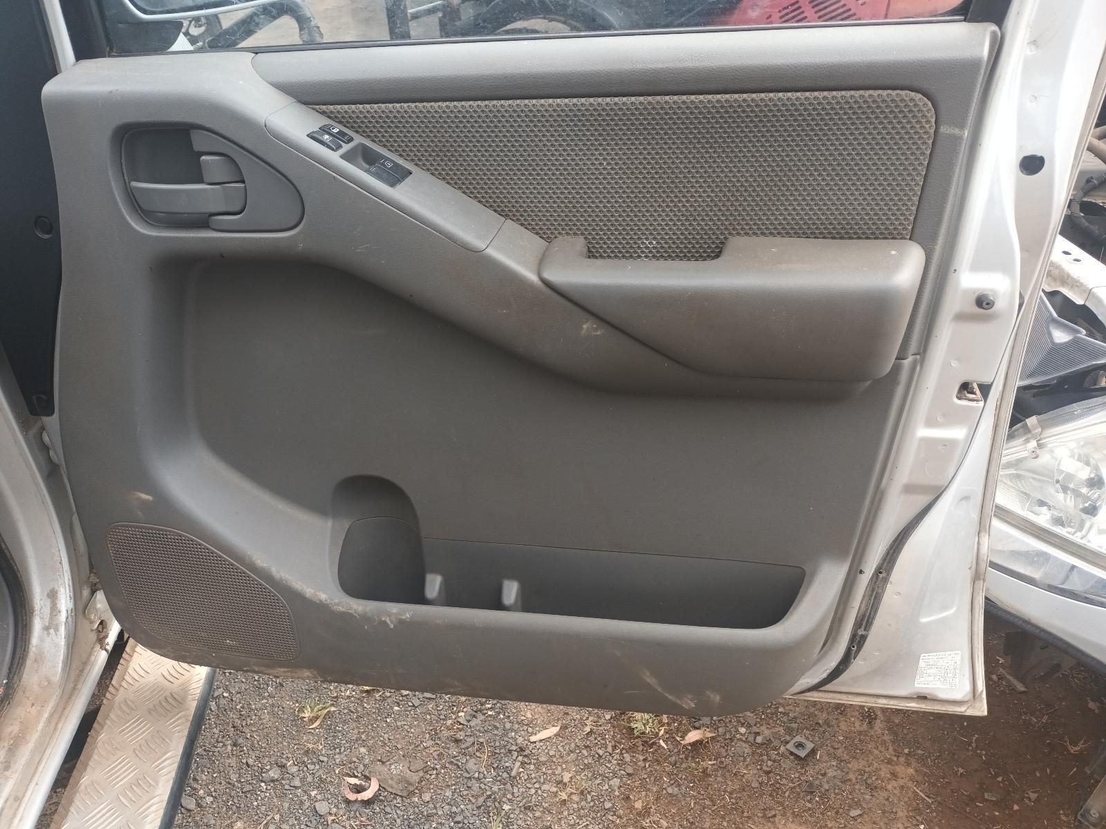 The Door of a Car is Open and Sitting on the Ground — South West 4WD Wreckers In Brisbane, QLD