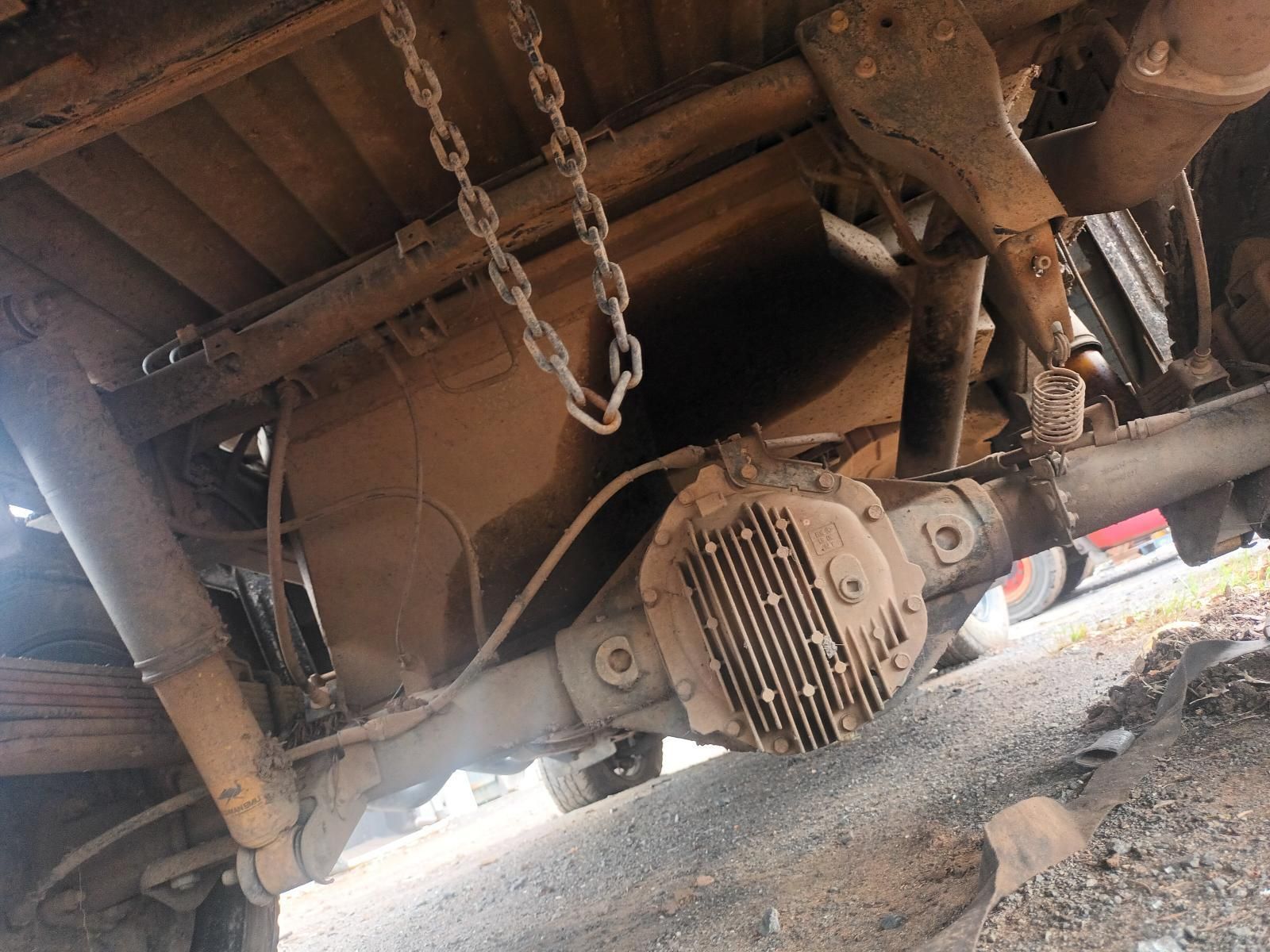 A Close Up of the Underside of a Truck with Chains Hanging from It — South West 4WD Wreckers In Brisbane, QLD