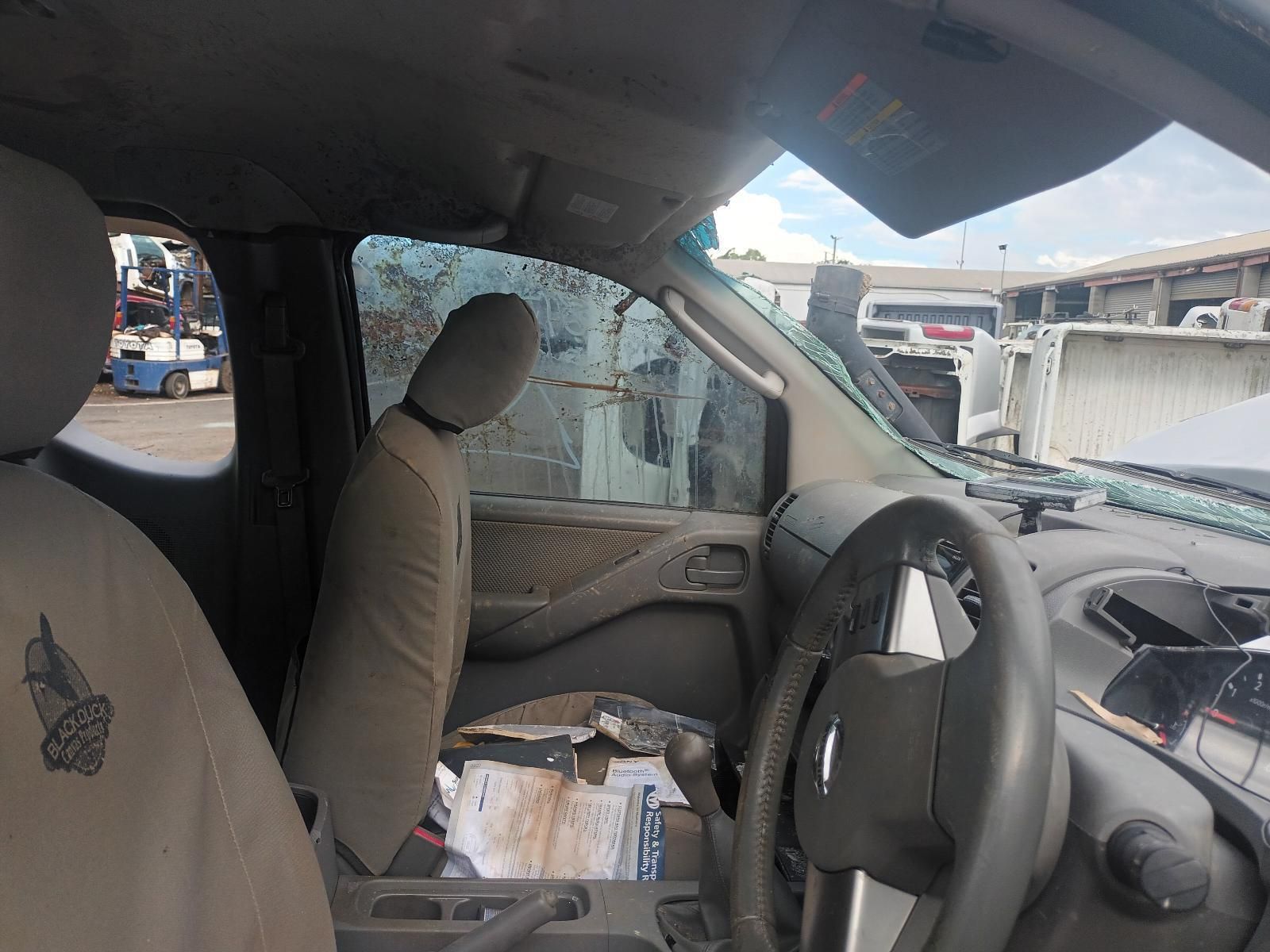 The Inside of a Car with a Broken Windshield and Steering Wheel — South West 4WD Wreckers In Brisbane, QLD