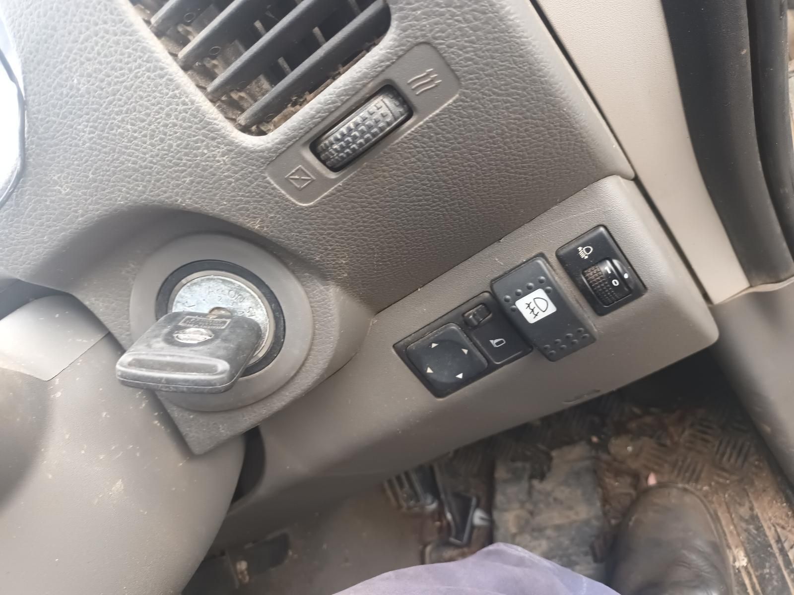 A Person is Sitting in a Car with a Key in the Ignition — South West 4WD Wreckers In Brisbane, QLD