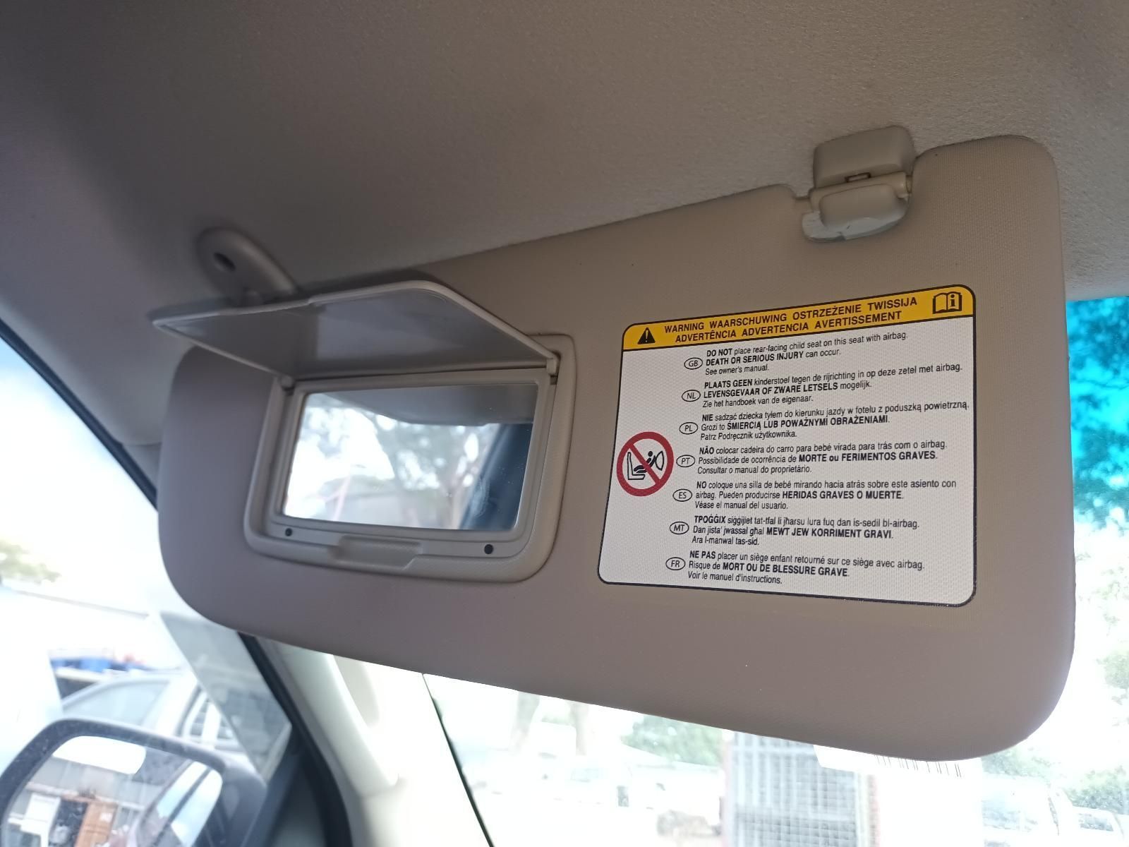 A Car Sun Visor with a Warning Sign on It — South West 4WD Wreckers In Brisbane, QLD