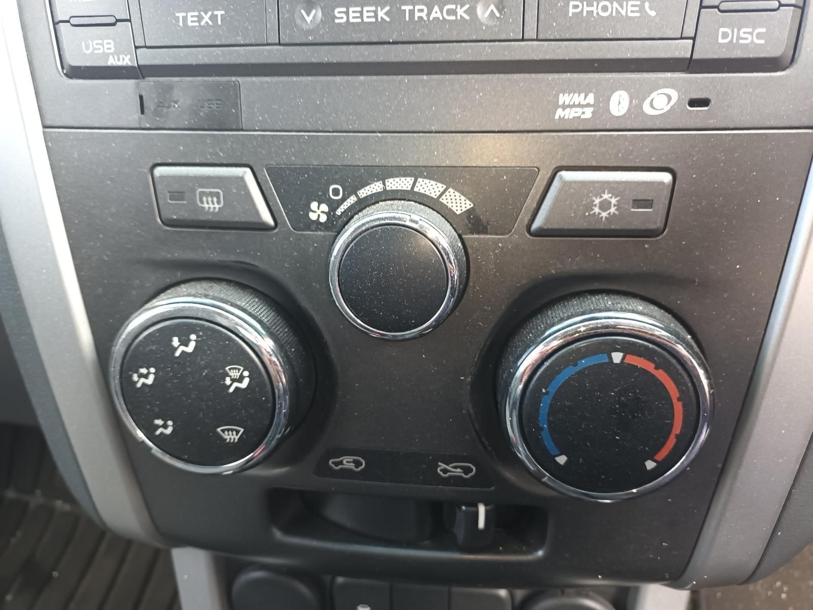 A Close Up of a Car Dashboard with a Seek Track Button — South West 4WD Wreckers In Brisbane, QLD 
