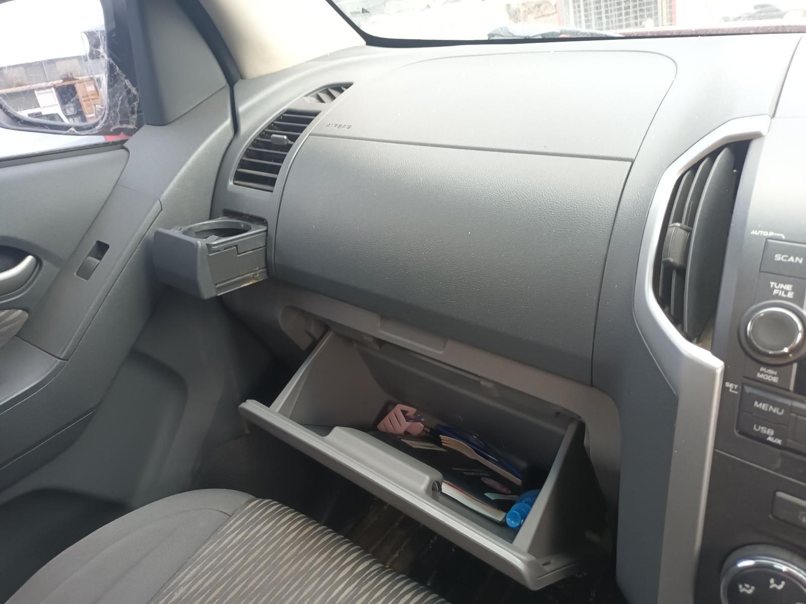 A Car Has a Glove Box with Keys in It — South West 4WD Wreckers In Brisbane, QLD