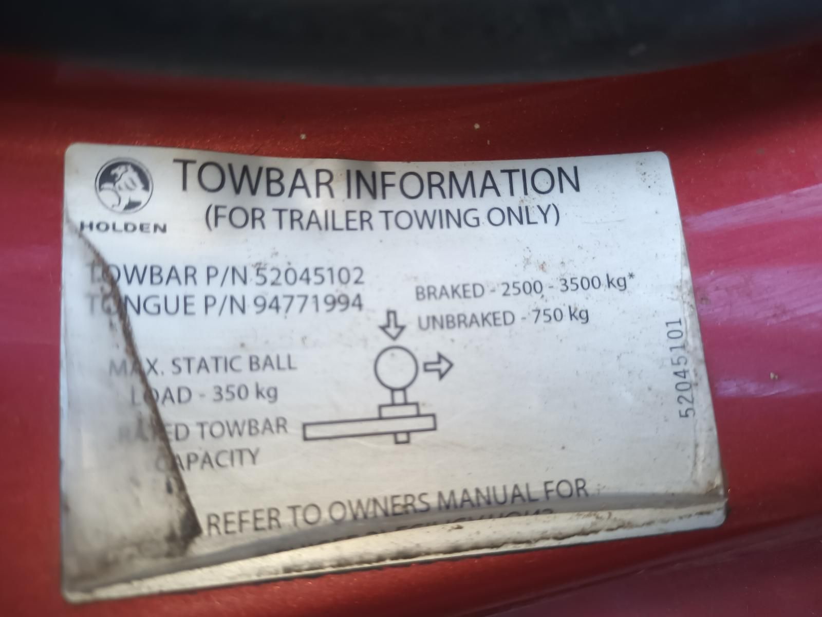 A Towbar Information Label on a Red Vehicle — South West 4WD Wreckers In Brisbane, QLD
