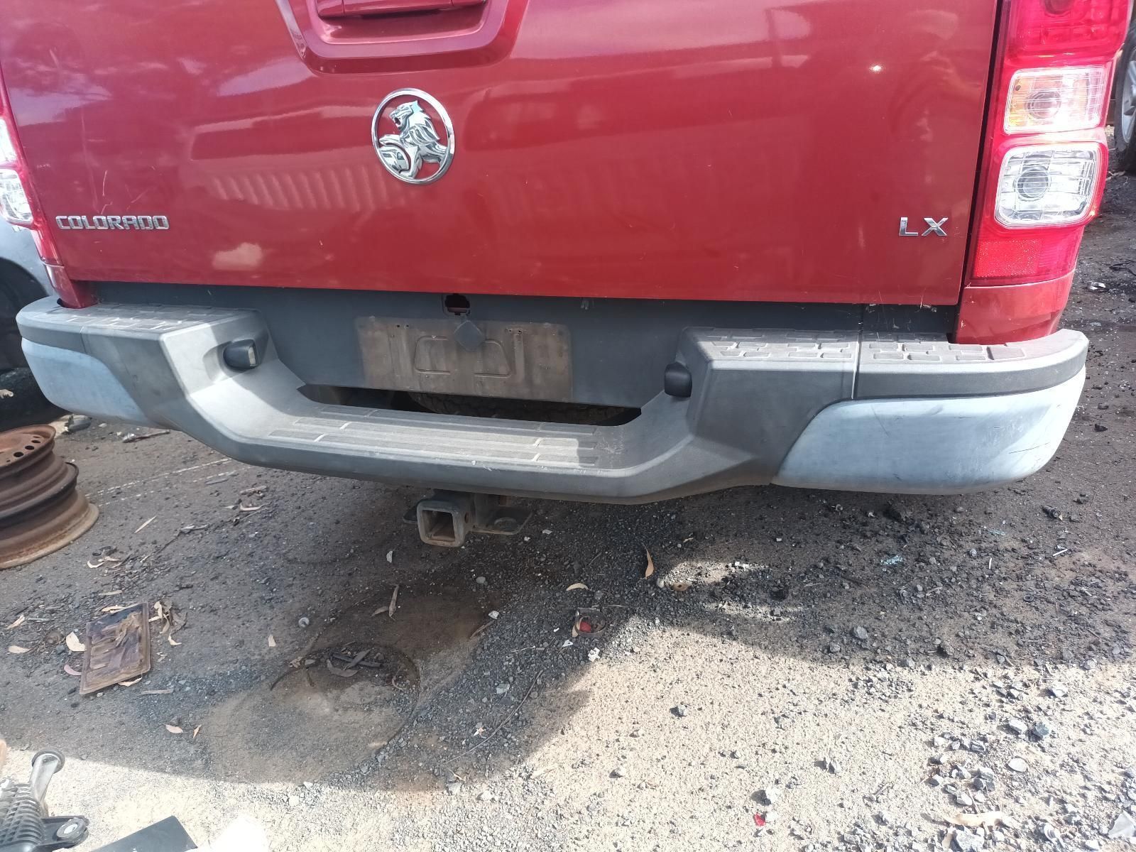 The Back Bumper of a Red Pickup — South West 4WD Wreckers In Brisbane, QLD