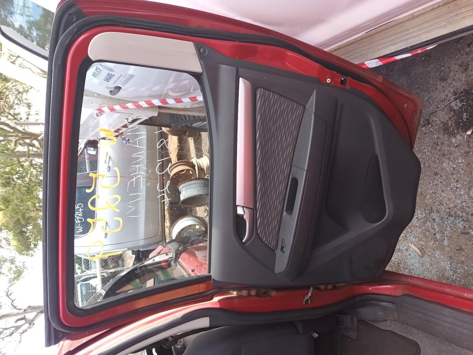 The Inside of a Red Car with the Door Open — South West 4WD Wreckers In Brisbane, QLD