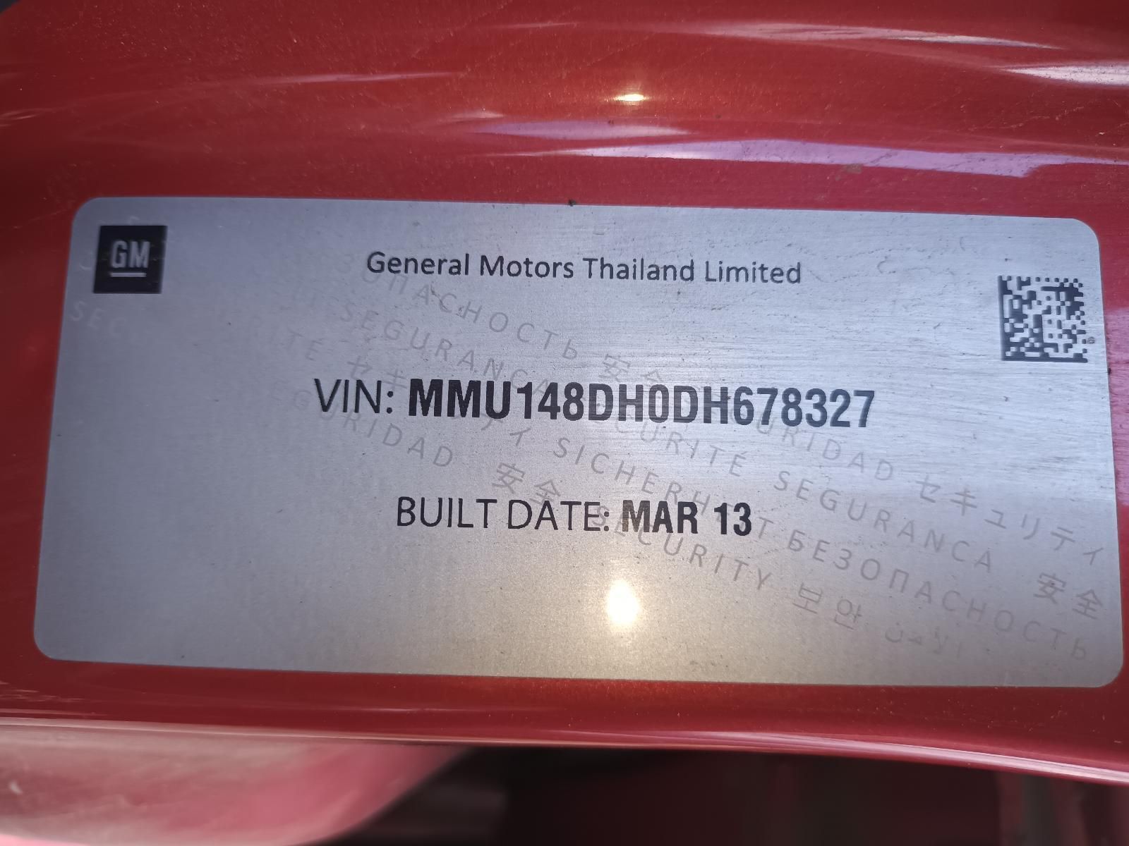 A Red Gm Car with a Built Date of March 13 — South West 4WD Wreckers In Brisbane, QLD