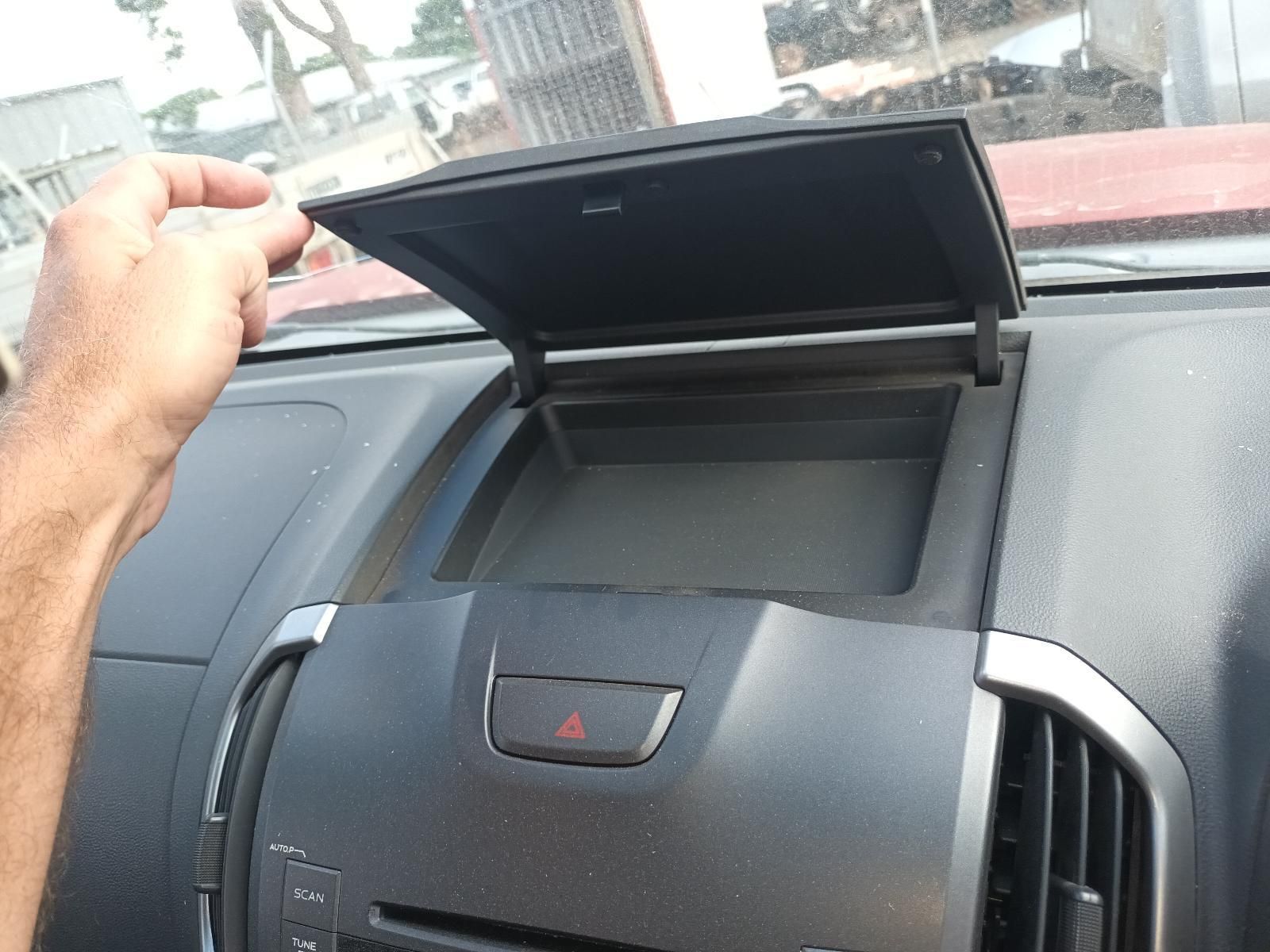 A Person is Opening the Dashboard of a Car — South West 4WD Wreckers In Brisbane, QLD