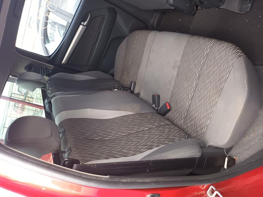 The Back Seat of a Red Car with a Gray Seat Cover — South West 4WD Wreckers In Brisbane, QLD