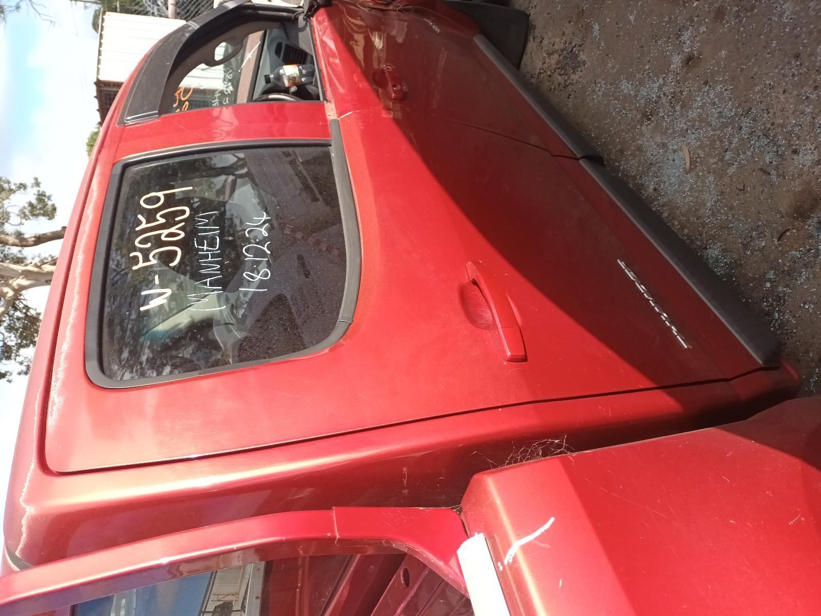 A Red Truck with the Numbers on the Back of It — South West 4WD Wreckers In Brisbane, QLD