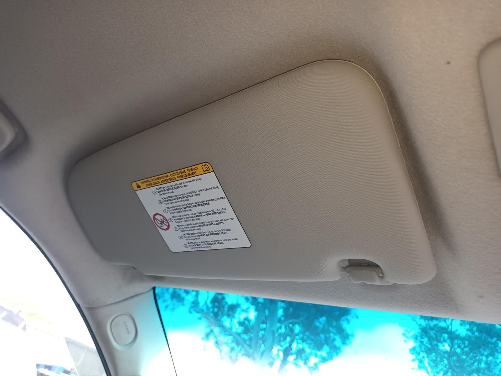 A Car Sun Visor with a Warning Label on It — South West 4WD Wreckers In Brisbane, QLD