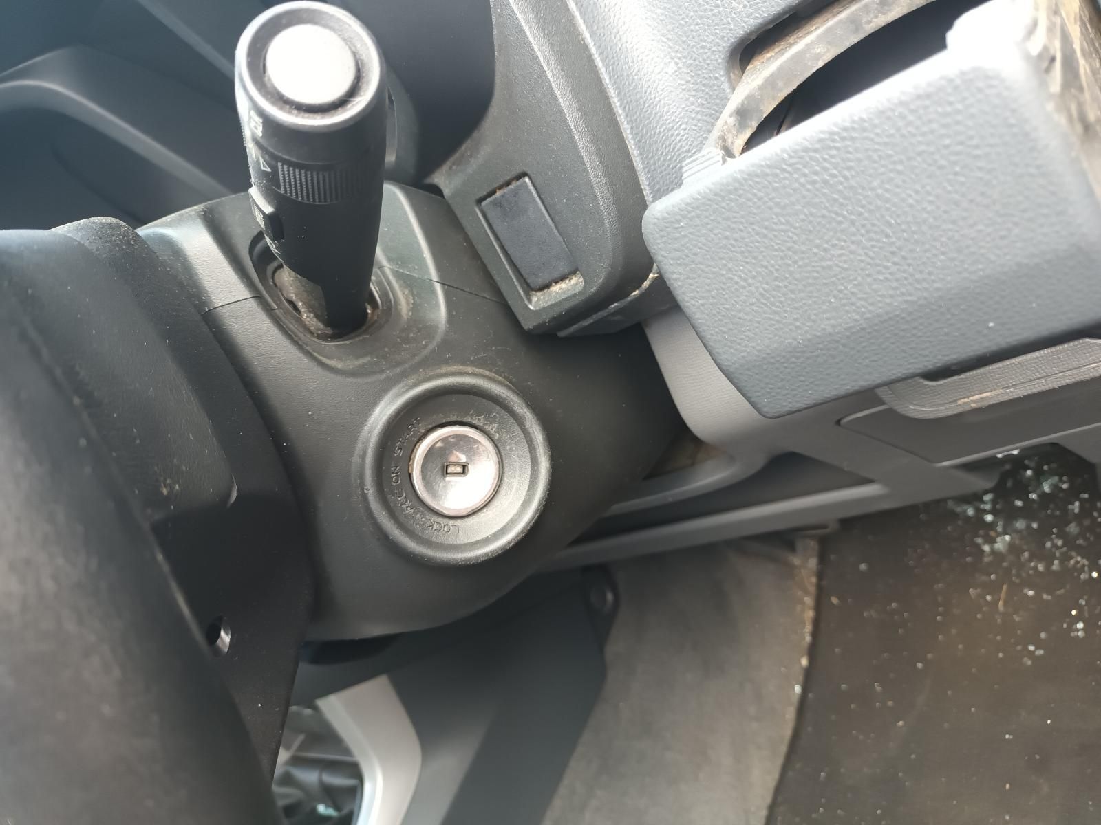 A Close Up of a Car Steering Wheel with a Key in It — South West 4WD Wreckers In Brisbane, QLD