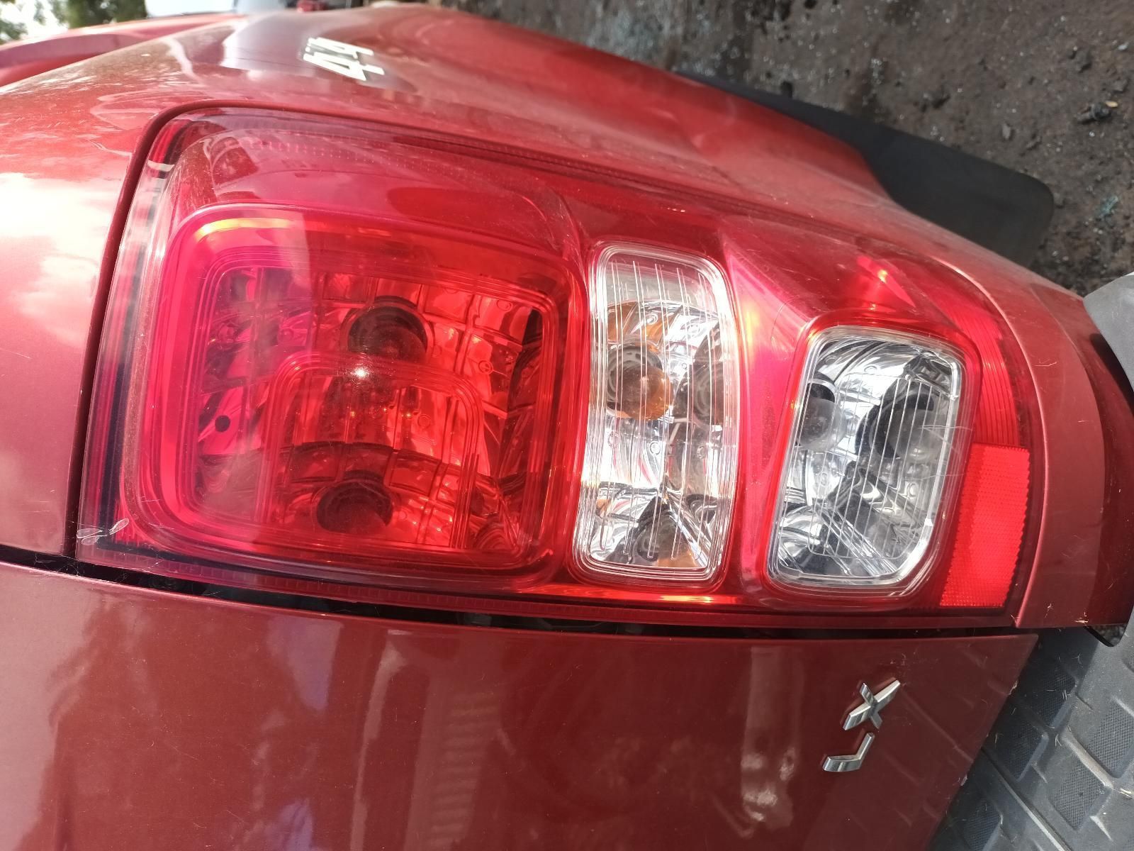 A Close Up of a Red Car's Tail Light — South West 4WD Wreckers In Brisbane, QLD