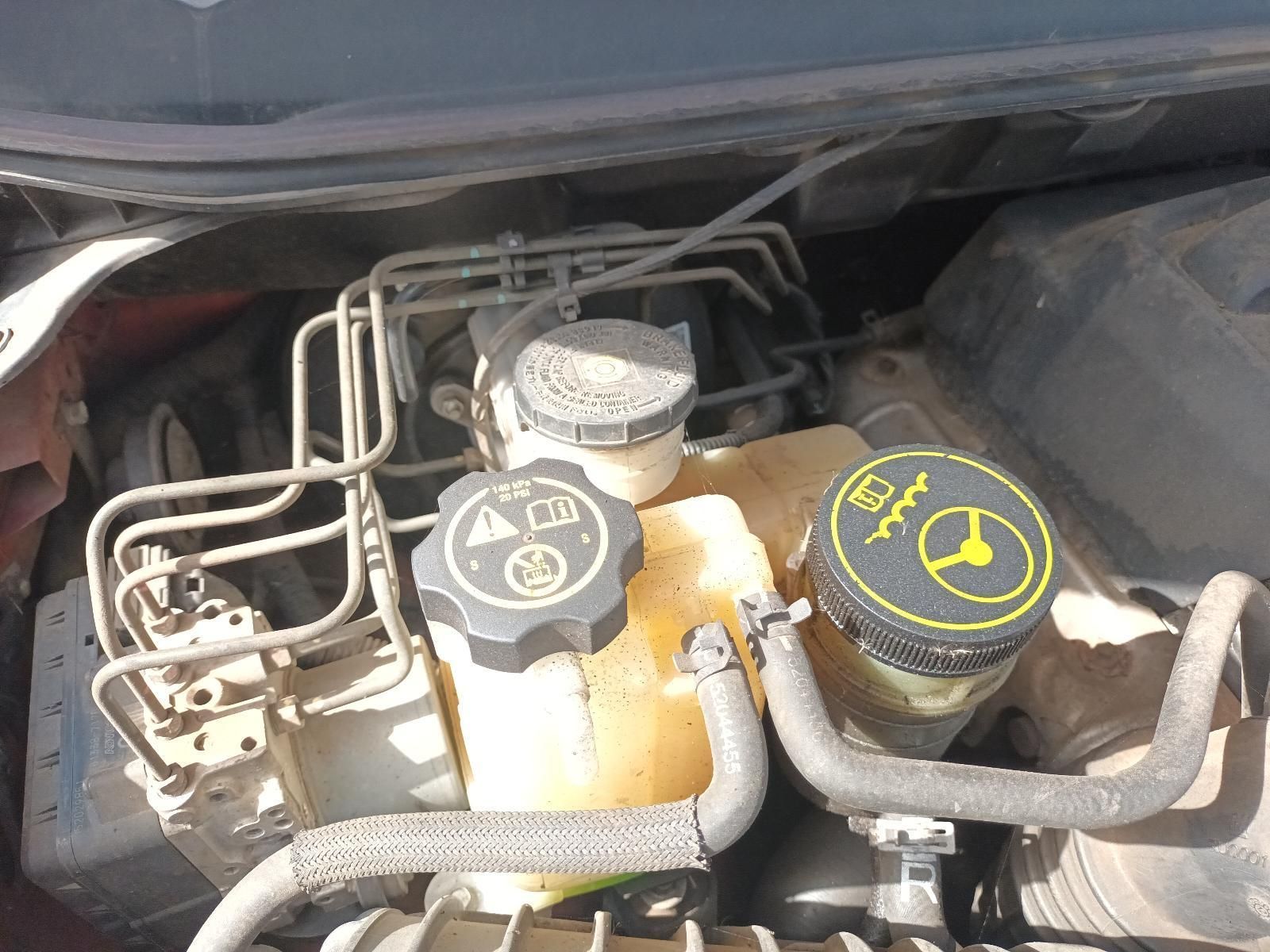 A Close Up of the Engine of a Car with a Yellow Cap on It — South West 4WD Wreckers In Brisbane, QLD