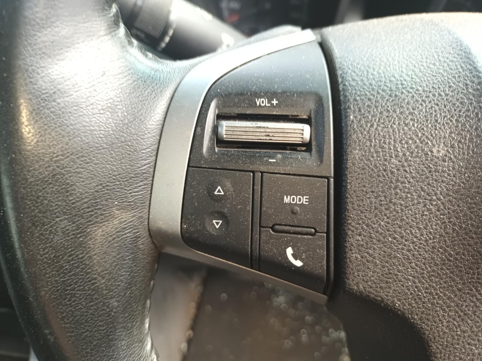 A Close Up of a Steering Wheel with a Remote Control on It — South West 4WD Wreckers In Brisbane, QLD