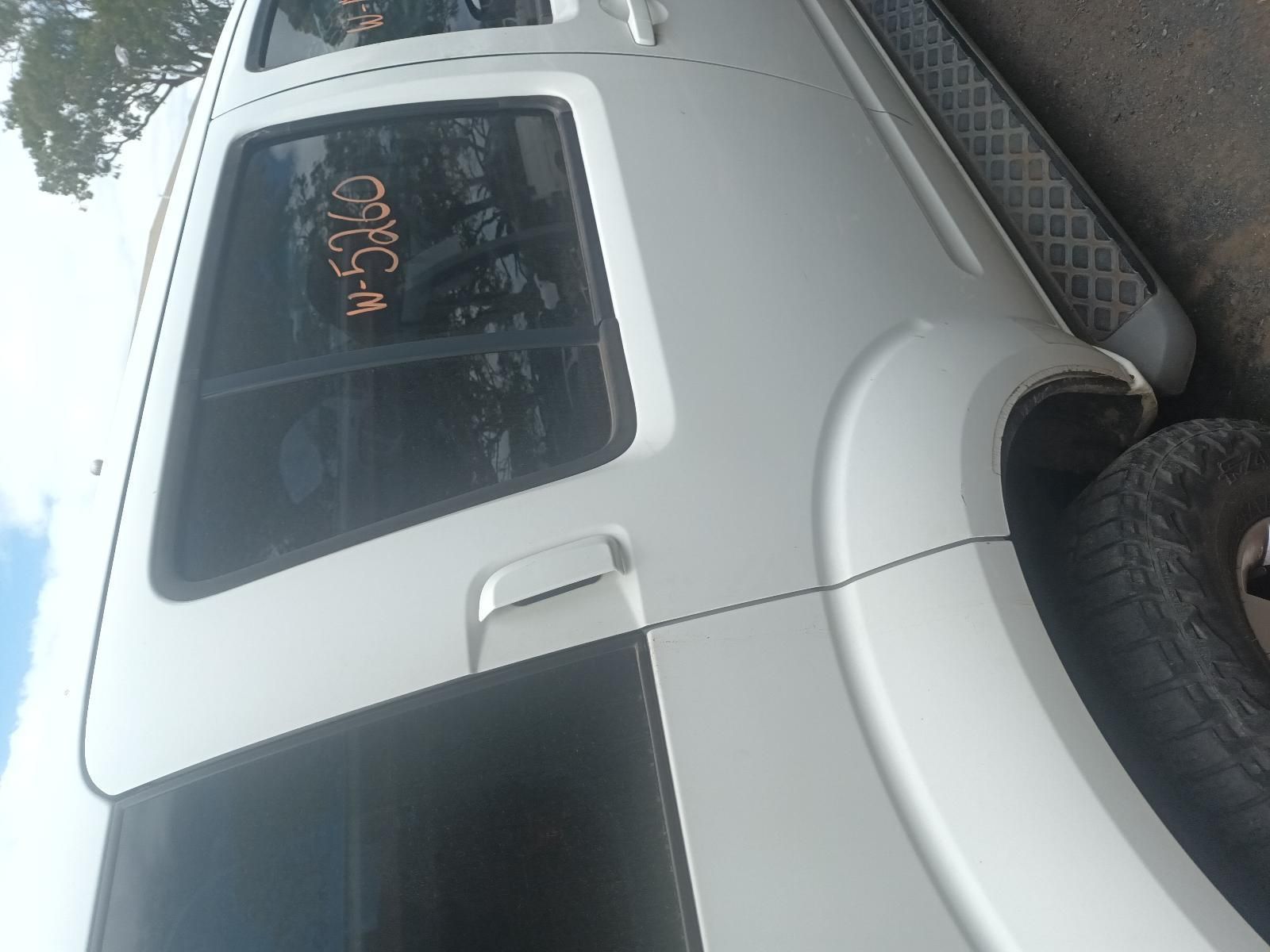 A Side View White Car — South West 4WD Wreckers In Brisbane, QLD