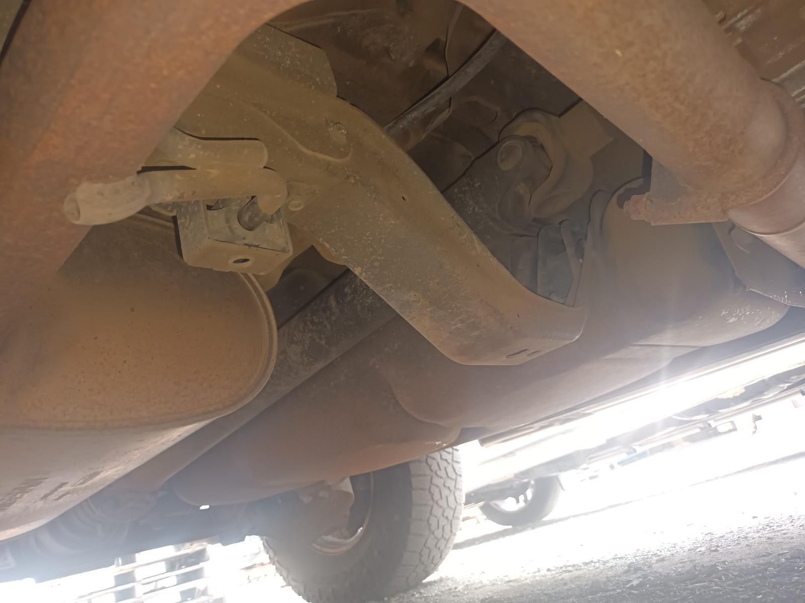 A Close Up of the Underside of a Car with an Exhaust Pipe — South West 4WD Wreckers In Brisbane, QLD